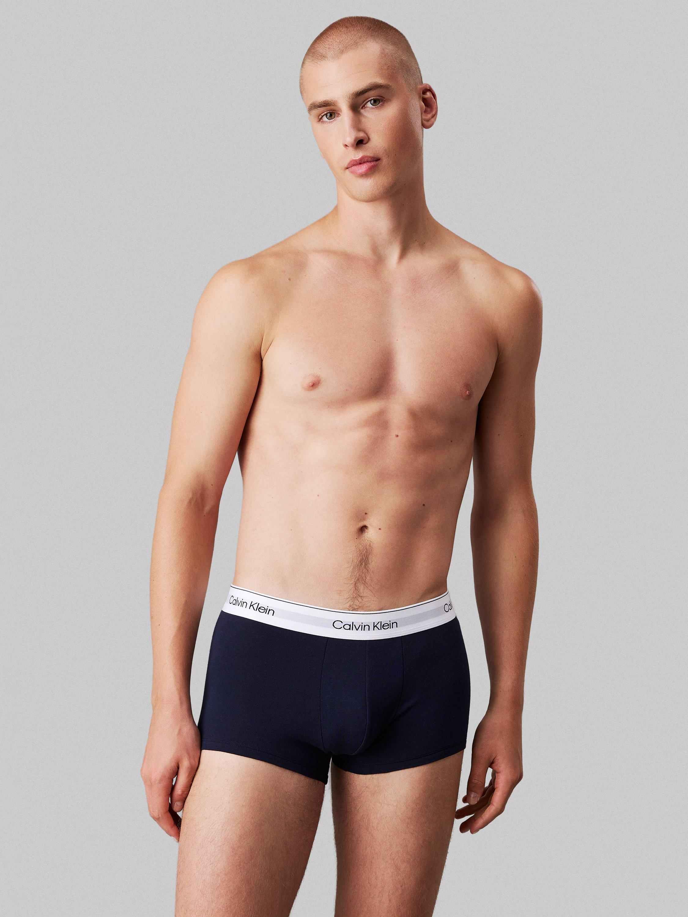 Product image 5 of 6, which shows Calvin Klein Icon Low Rise Stretch Trunks, Pack of 3, Shoreline, Gr Heathe, S