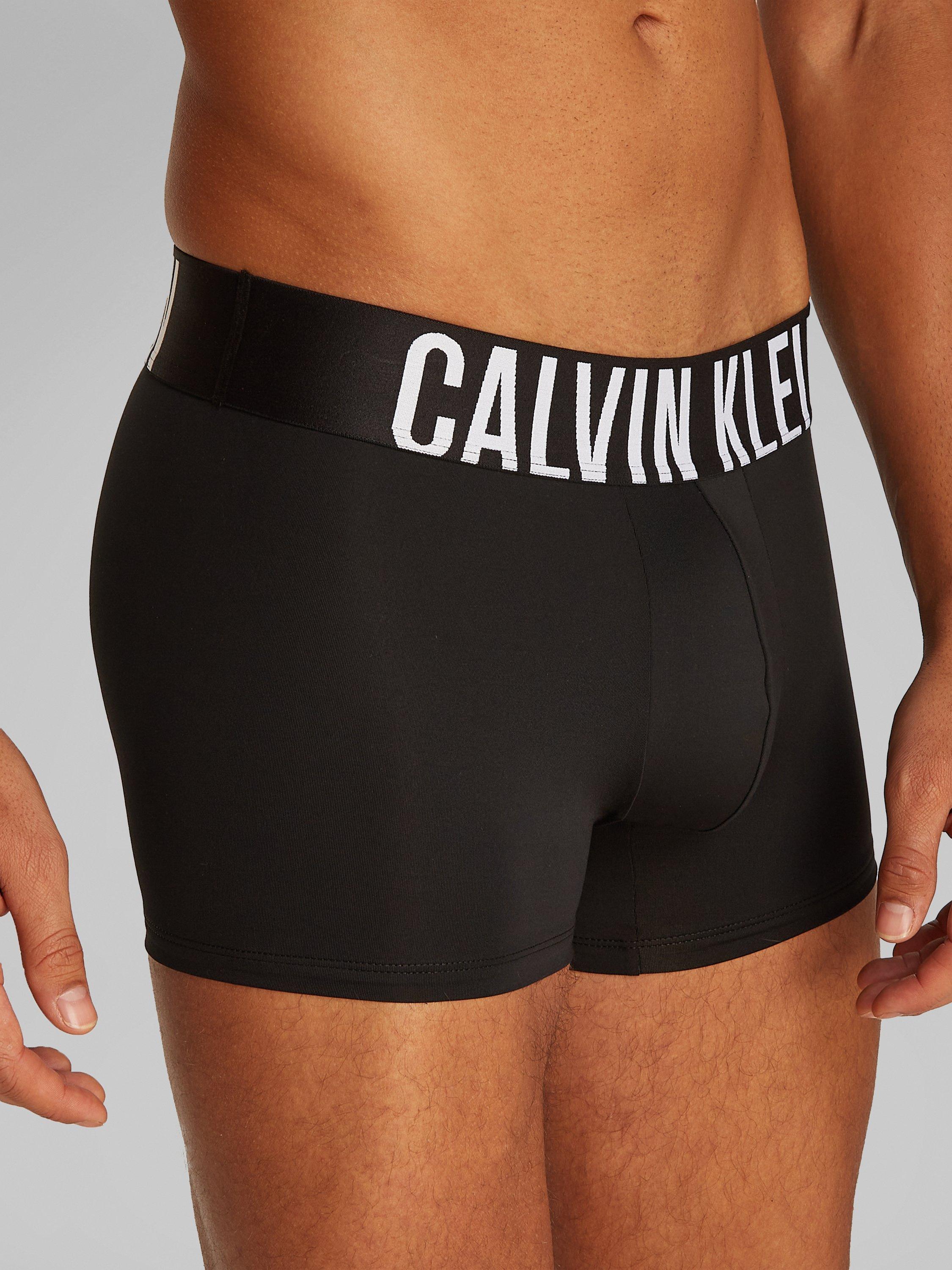 Product image 4 of 6, which shows Calvin Klein Intense Power Waistband Trunks, Pack of 3, Black/Misty Grey, XS
