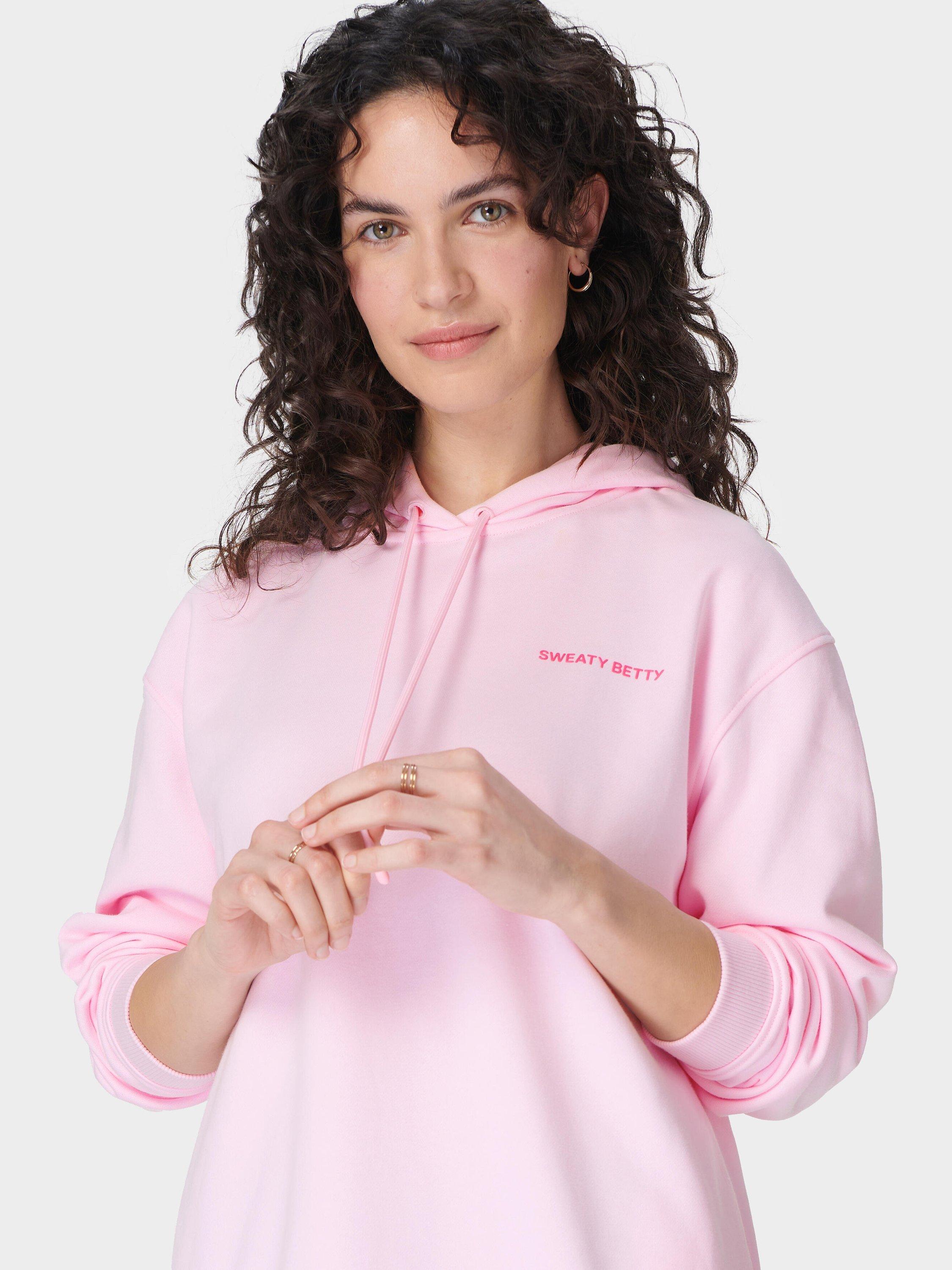 Product image 5 of 7, which shows Sweaty Betty Revive Longline Organic Cotton Rich Hoodie, Nerine Pink, L-XL