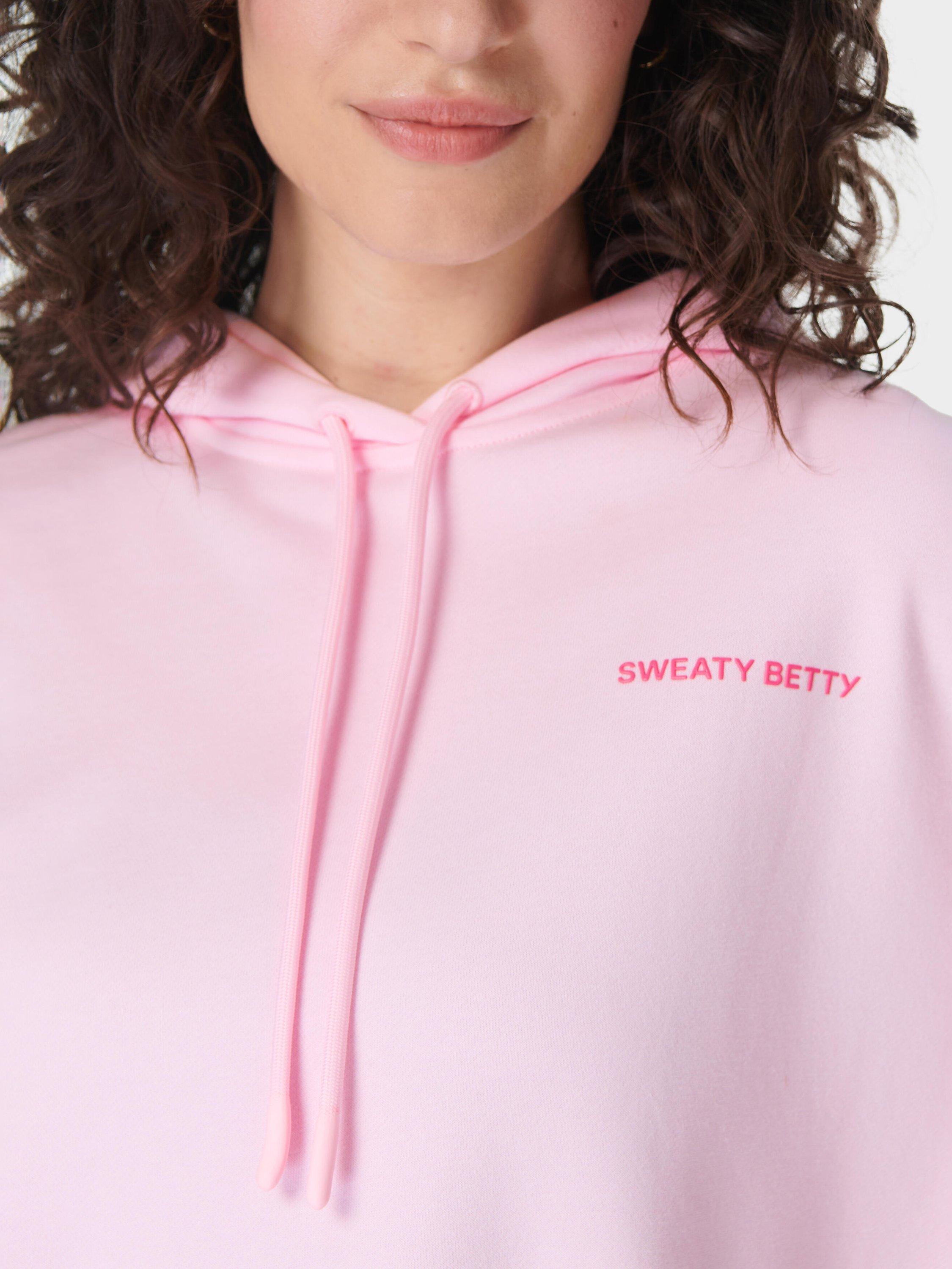 Product image 6 of 7, which shows Sweaty Betty Revive Longline Organic Cotton Rich Hoodie, Nerine Pink, L-XL