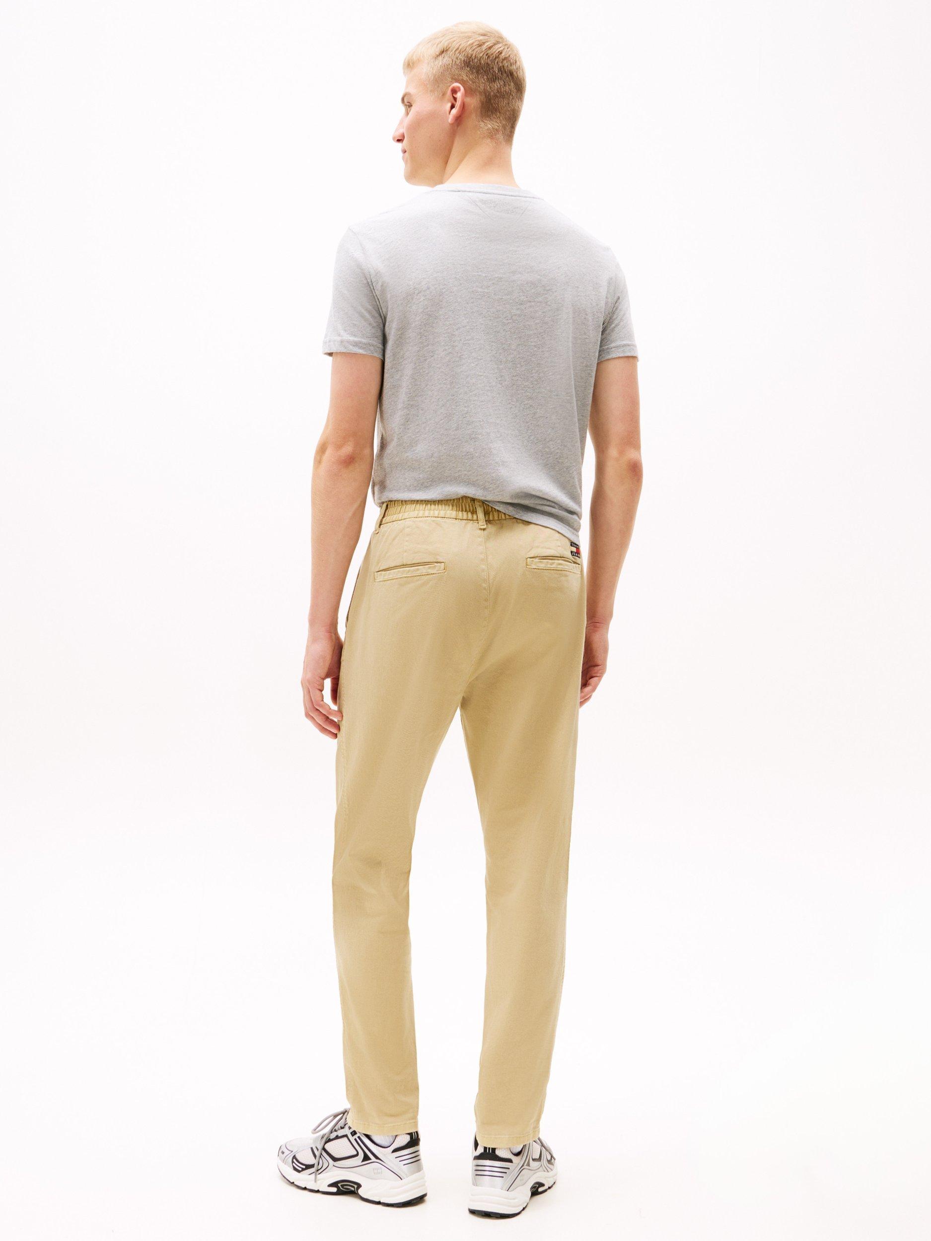 Product image 2 of 5, which shows Tommy Jeans Isaac Stretch Chinos, Relic Tan, S