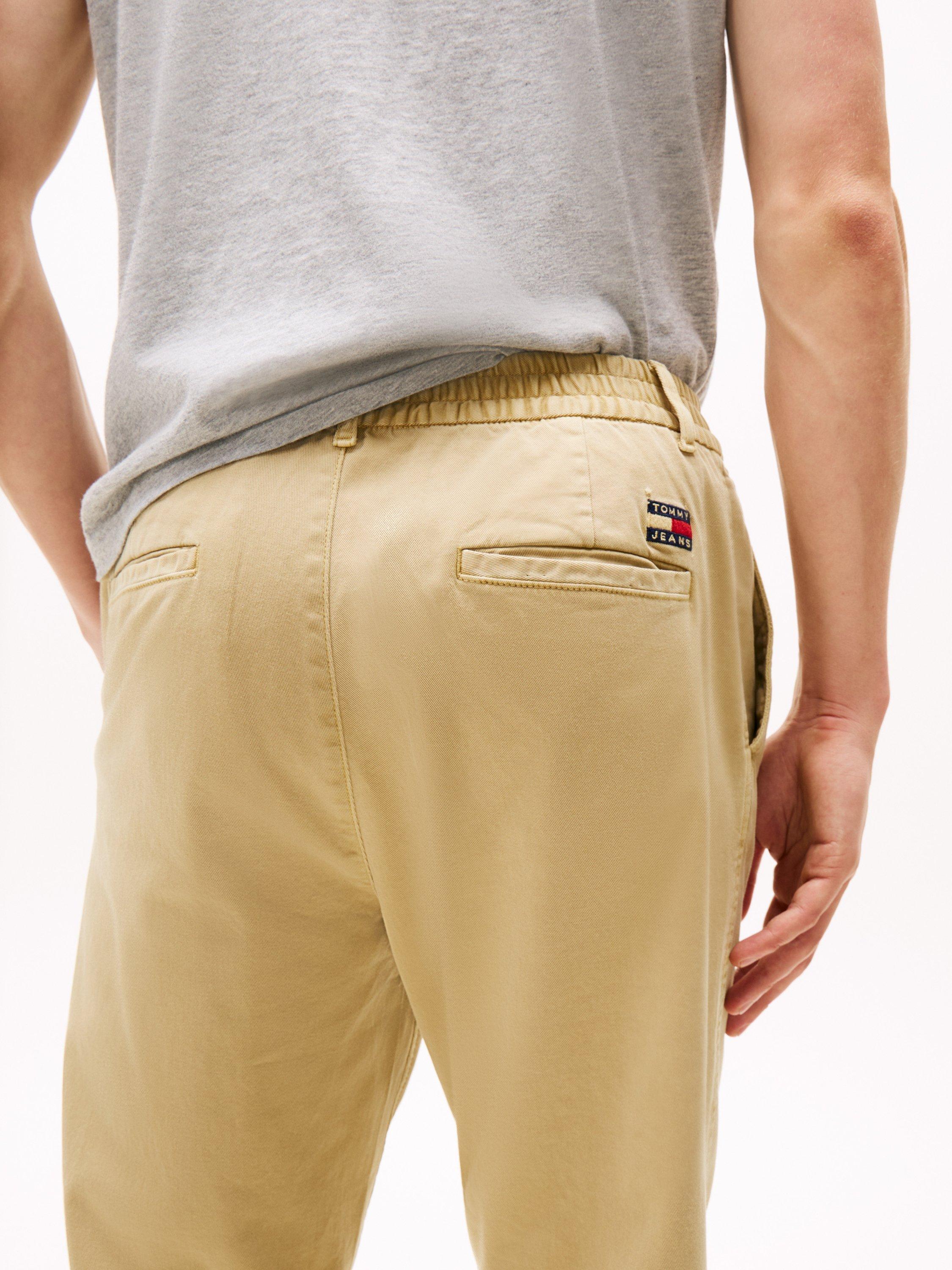 Product image 4 of 5, which shows Tommy Jeans Isaac Stretch Chinos, Relic Tan, S