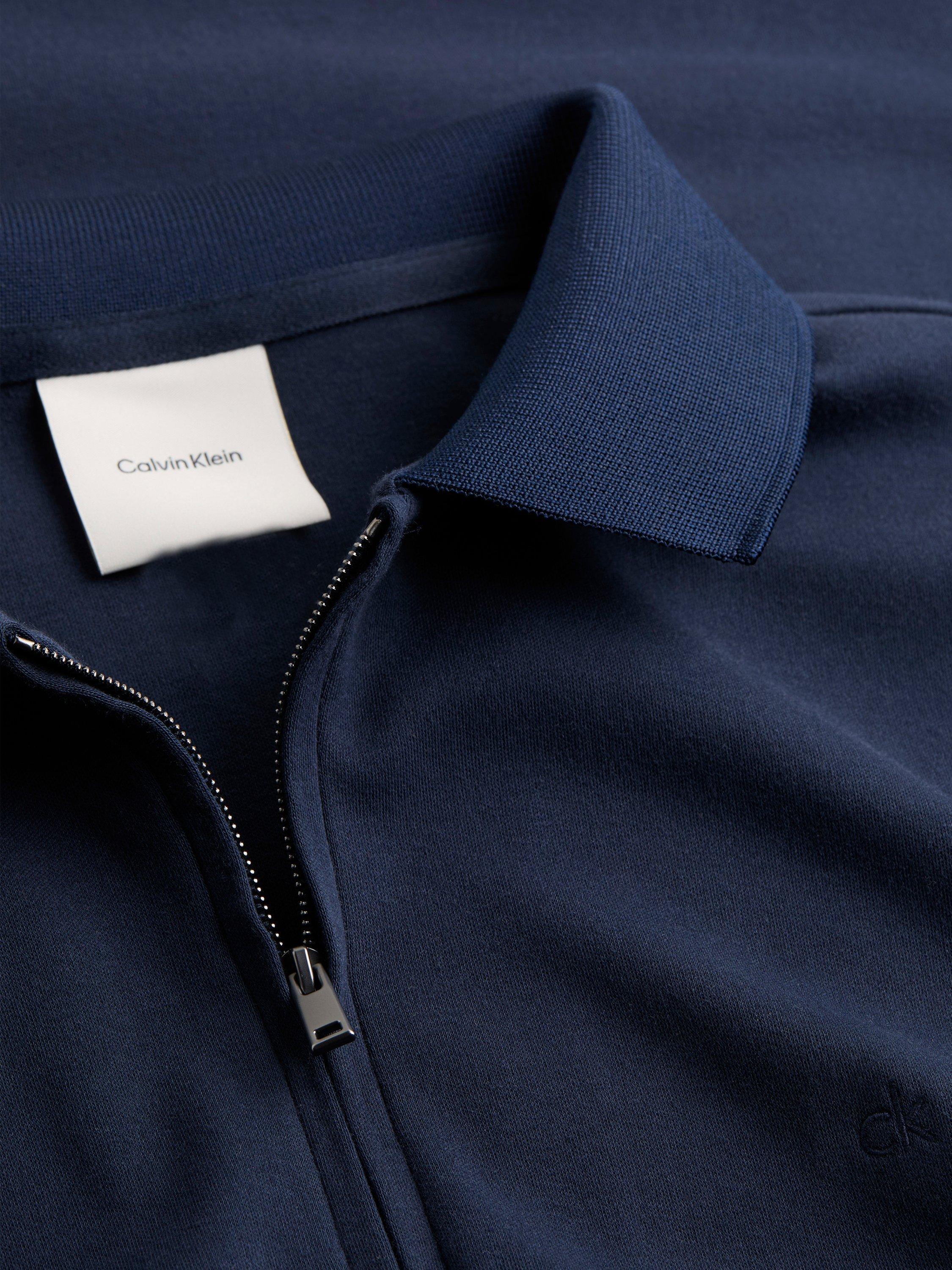 Product image 5 of 6, which shows Calvin Klein Organic Cotton Regular Fit Short Sleeve Zip Neck Polo Shirt, Dark Sapphire, XS