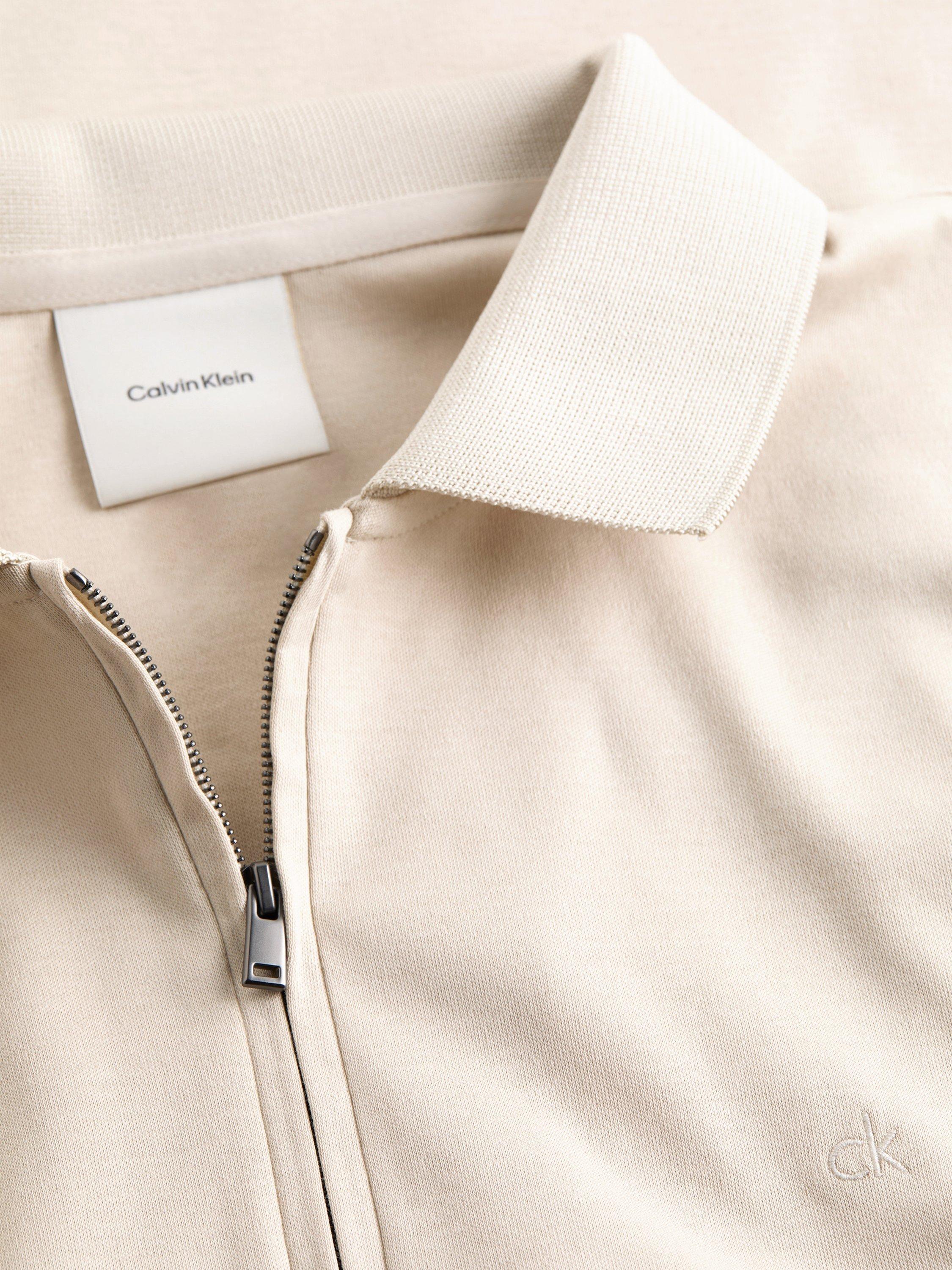 Product image 5 of 6, which shows Calvin Klein Organic Cotton Regular Fit Short Sleeve Zip Neck Polo Shirt, Oatmeal, XS