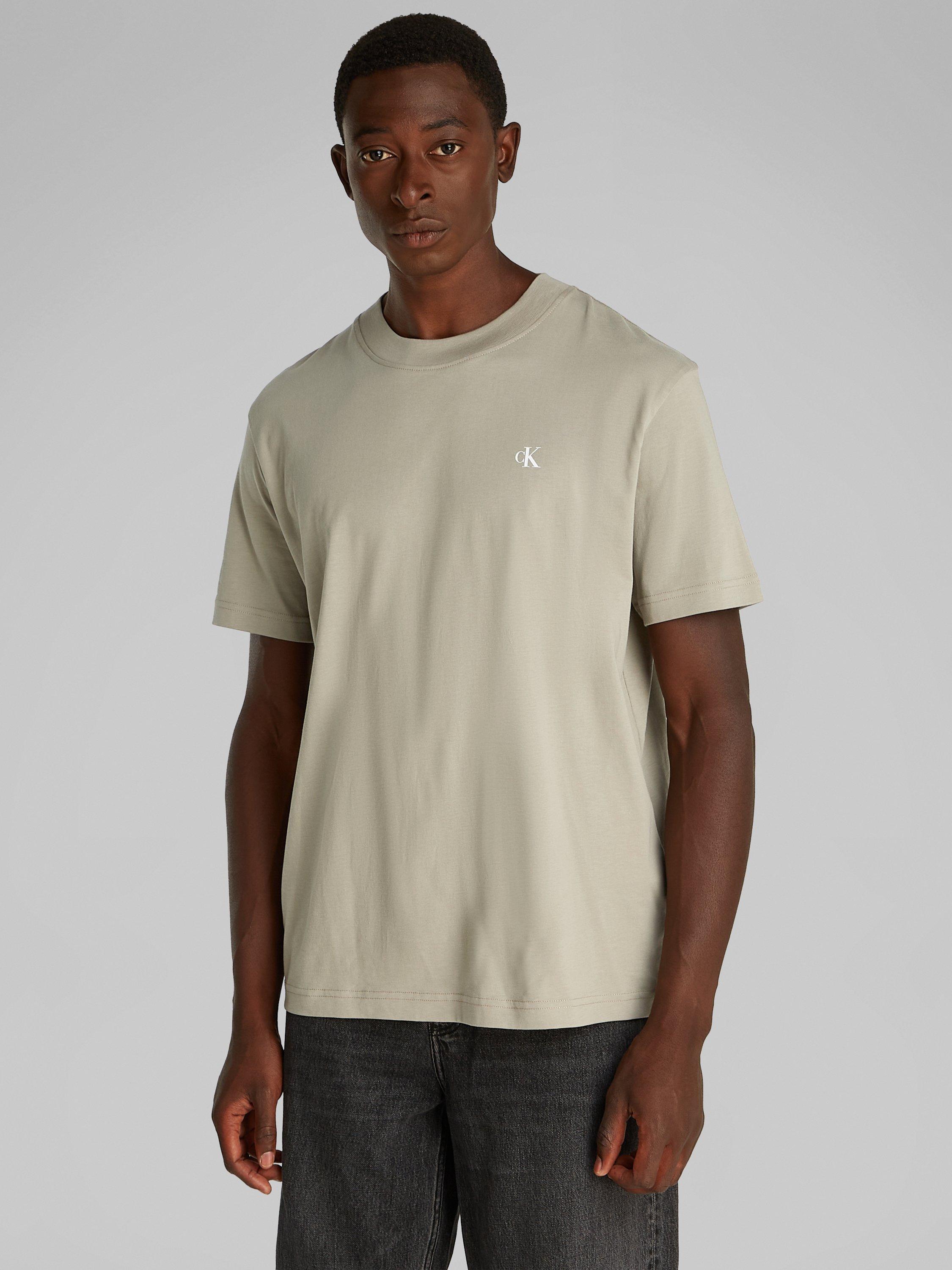 Product image 1 of 8, which shows Calvin Klein Jeans Cotton Regular Fit Short Sleeve Painted Logo T-Shirt, Laurel Oak, XS