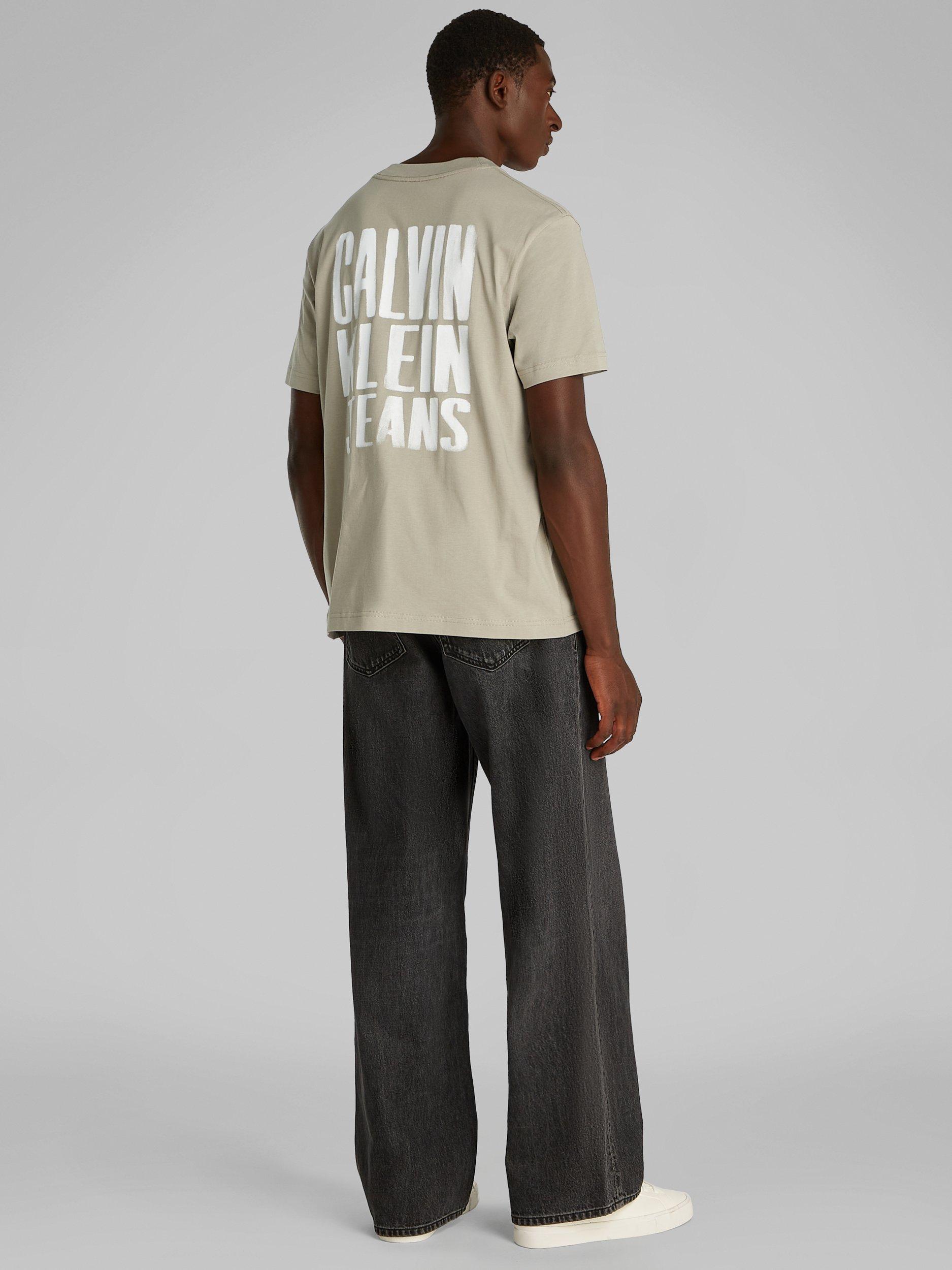 Product image 3 of 8, which shows Calvin Klein Jeans Cotton Regular Fit Short Sleeve Painted Logo T-Shirt, Laurel Oak, XS