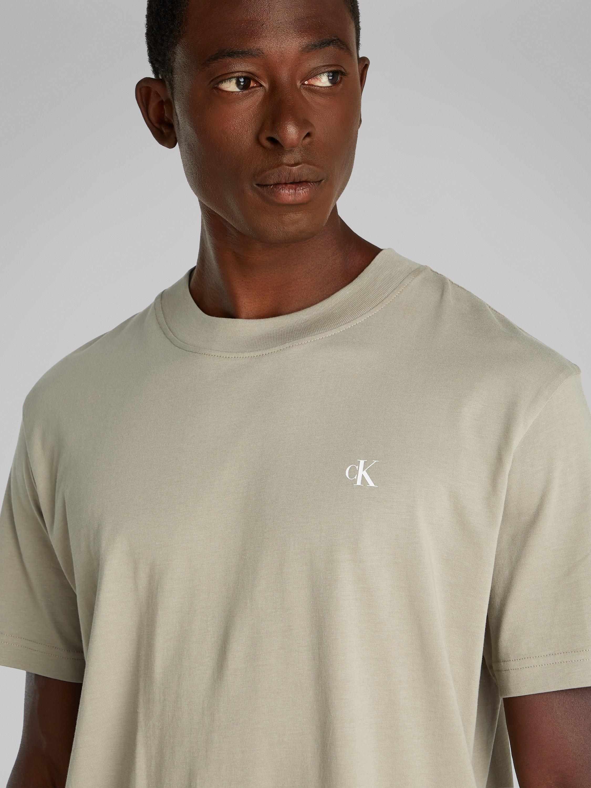 Product image 4 of 8, which shows Calvin Klein Jeans Cotton Regular Fit Short Sleeve Painted Logo T-Shirt, Laurel Oak, XS