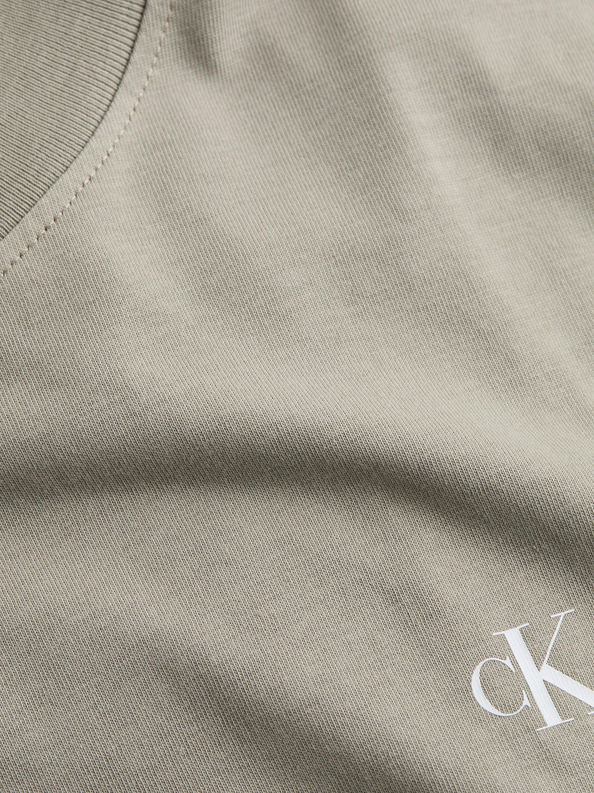 Product image 5 of 8, which shows Calvin Klein Jeans Cotton Regular Fit Short Sleeve Painted Logo T-Shirt, Laurel Oak, XS
