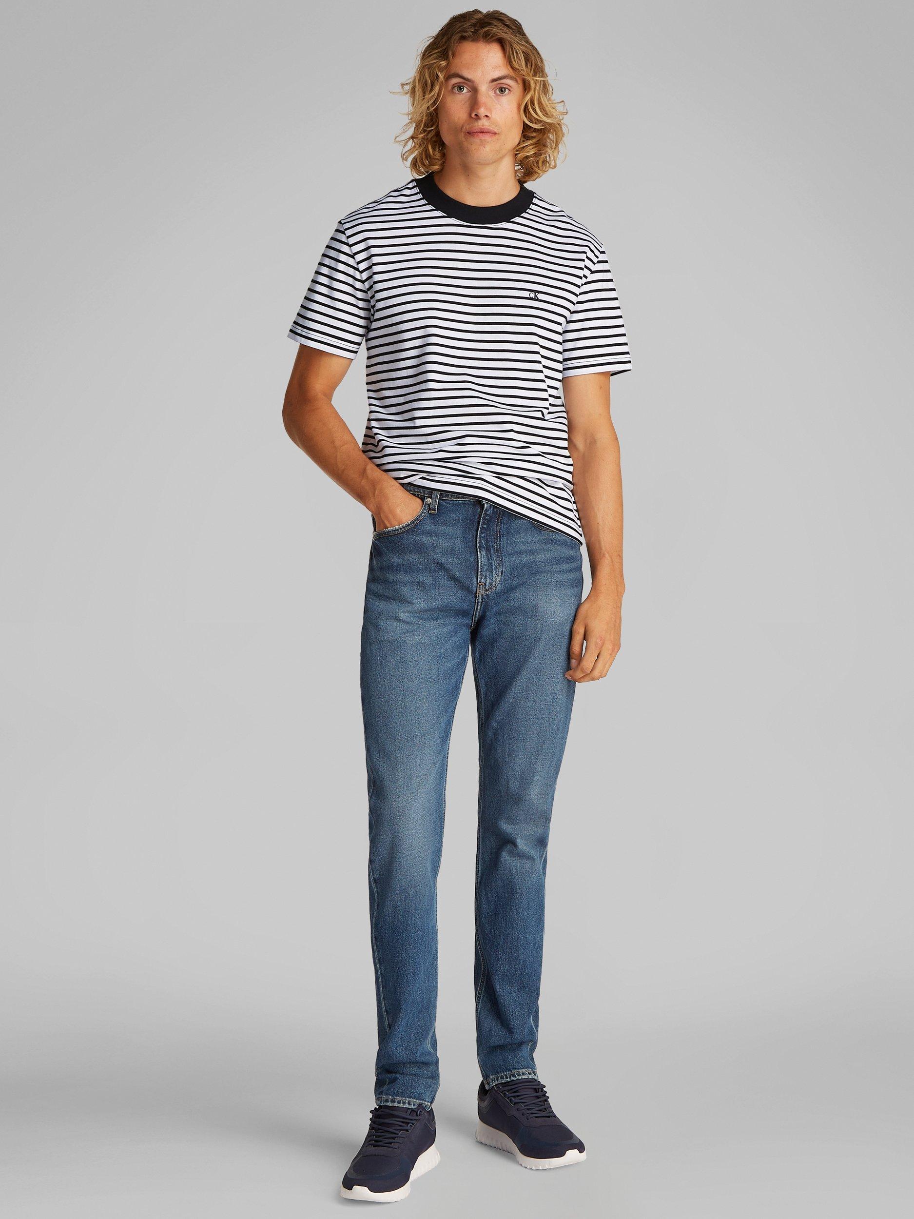 Product image 2 of 6, which shows Calvin Klein Jeans Cotton Regular Fit Short Sleeve Stripe T-Shirt, Black/White, S