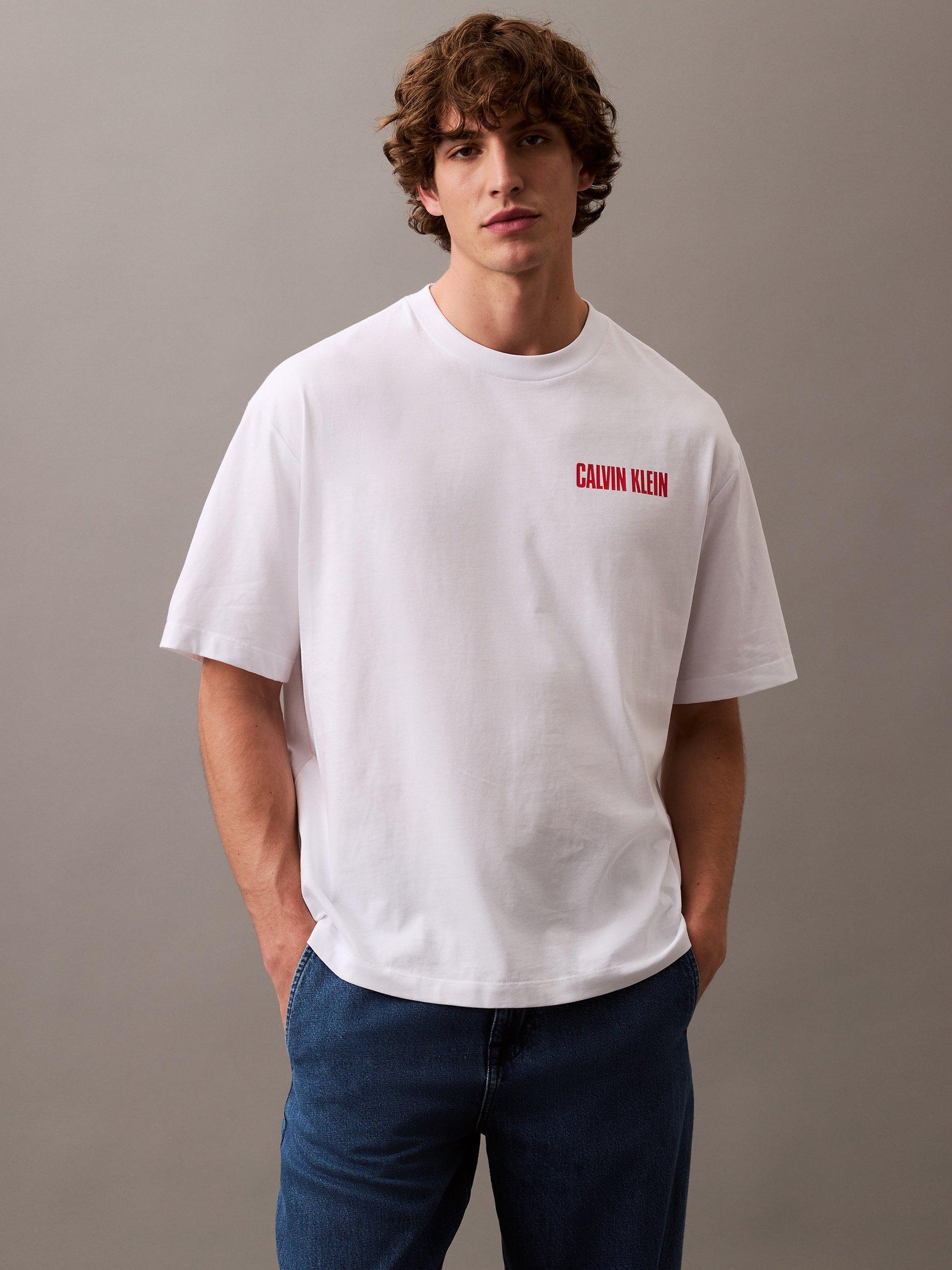 Product image 1 of 2, which shows Calvin Klein Cotton Relaxed Fit Short Sleeve Logo T-Shirt, Brilliant White, L