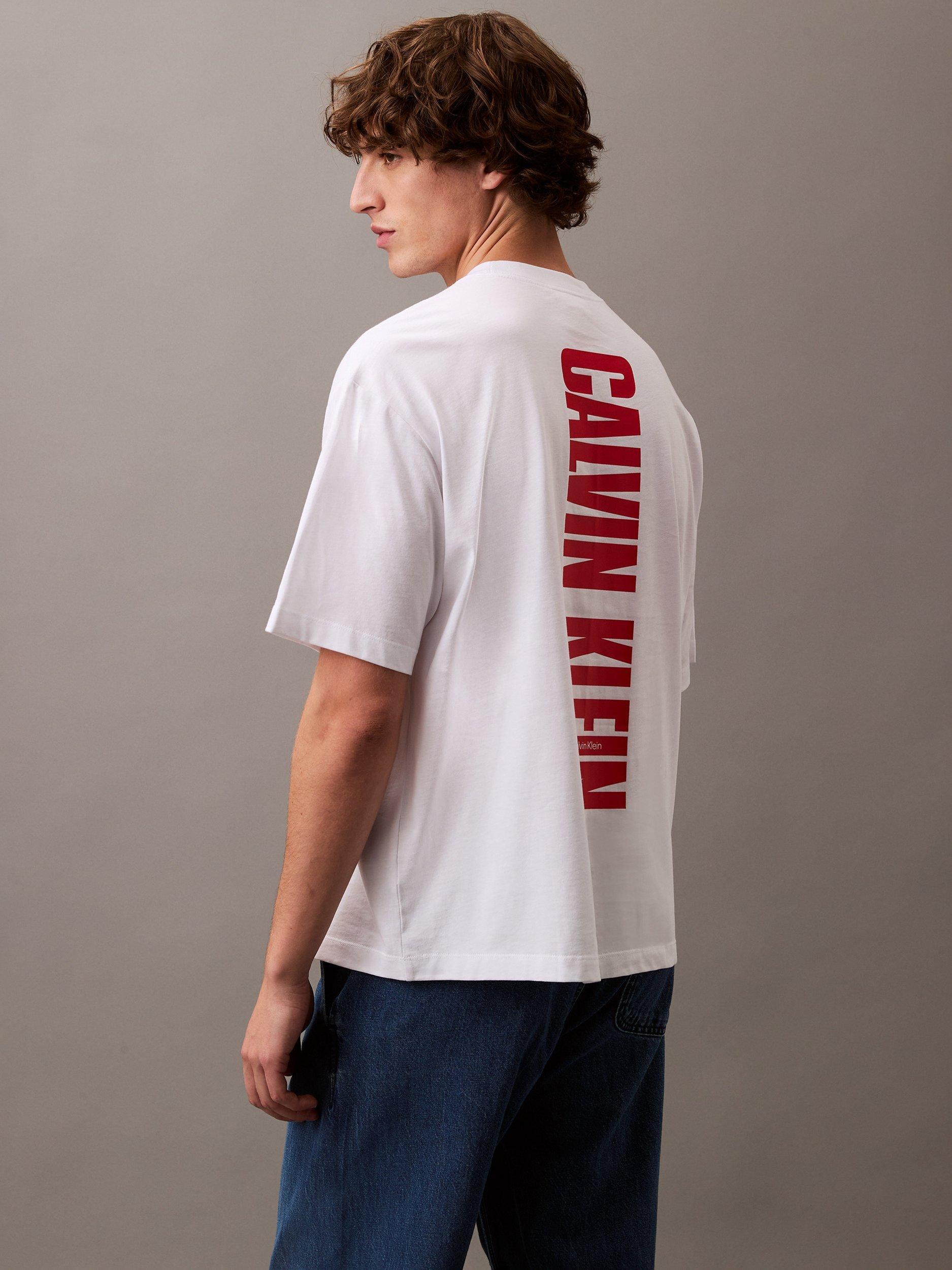 Product image 2 of 2, which shows Calvin Klein Cotton Relaxed Fit Short Sleeve Logo T-Shirt, Brilliant White, L