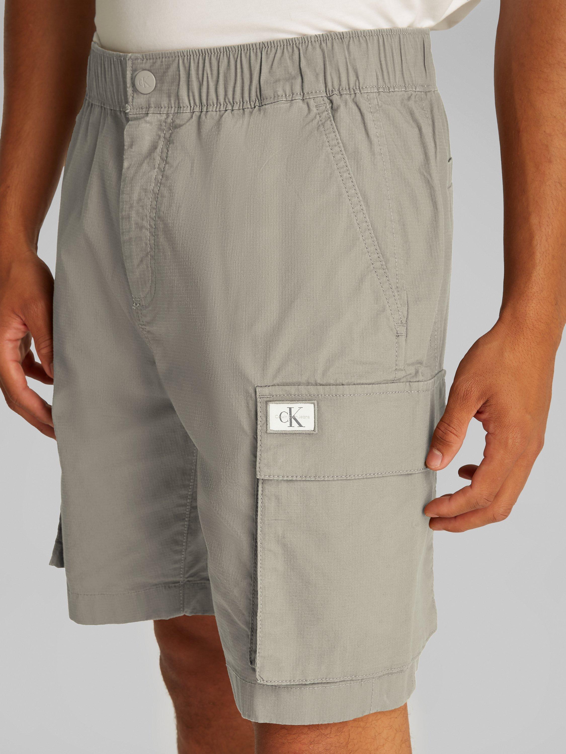 Product image 4 of 7, which shows Calvin Klein Jeans Cotton Blend Cargo Shorts, Laurel Oak, 28R