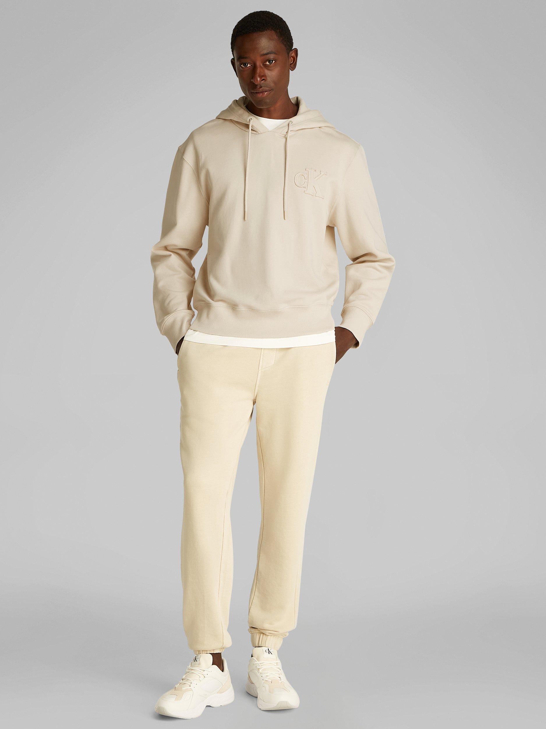Product image 2 of 6, which shows Calvin Klein Cotton Applique Hoodie, Oatmeal, XS