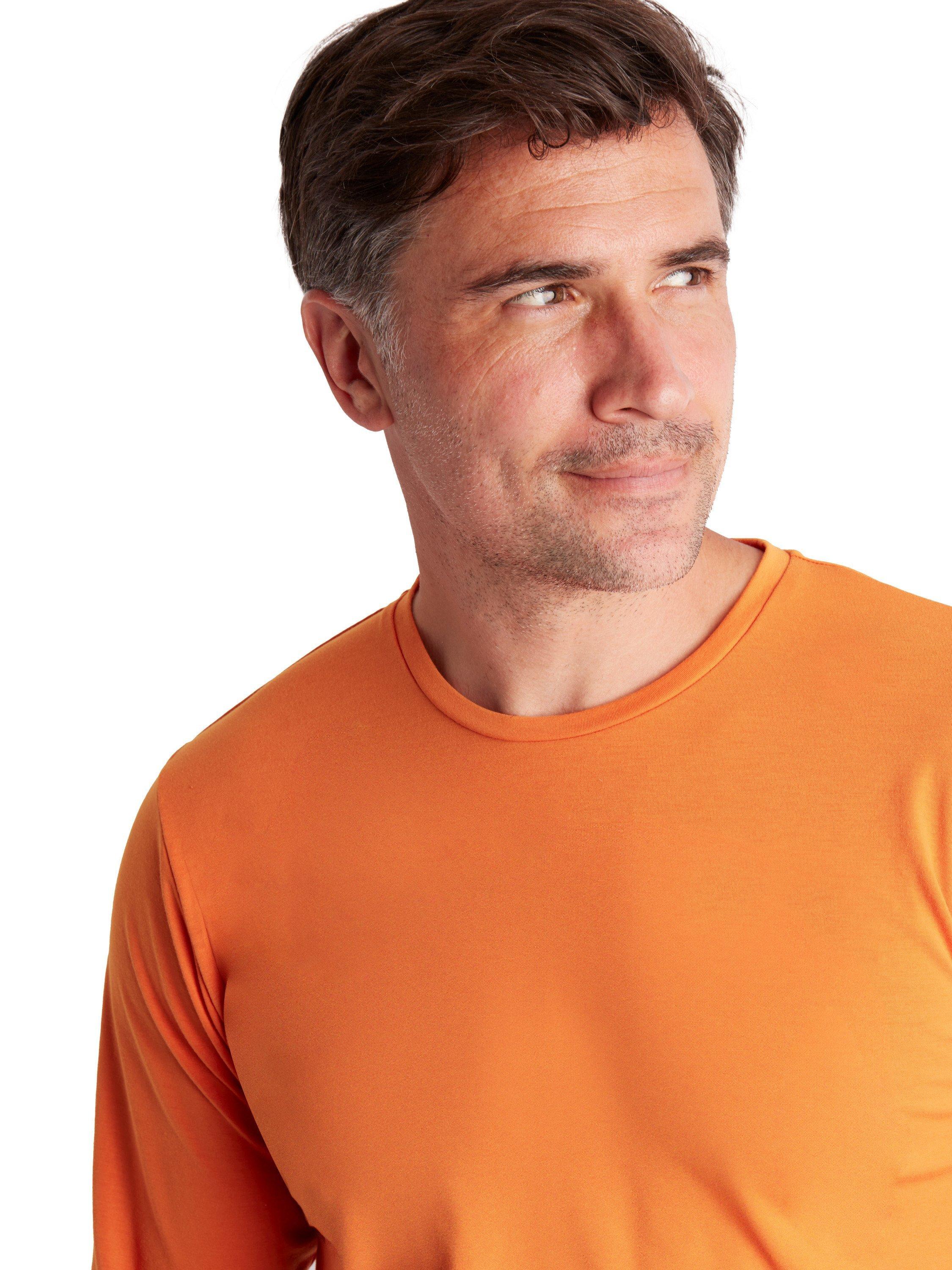 Product image 6 of 6, which shows Rohan Men's Global Long Sleeve T-Shirt, Spiced Orange, S