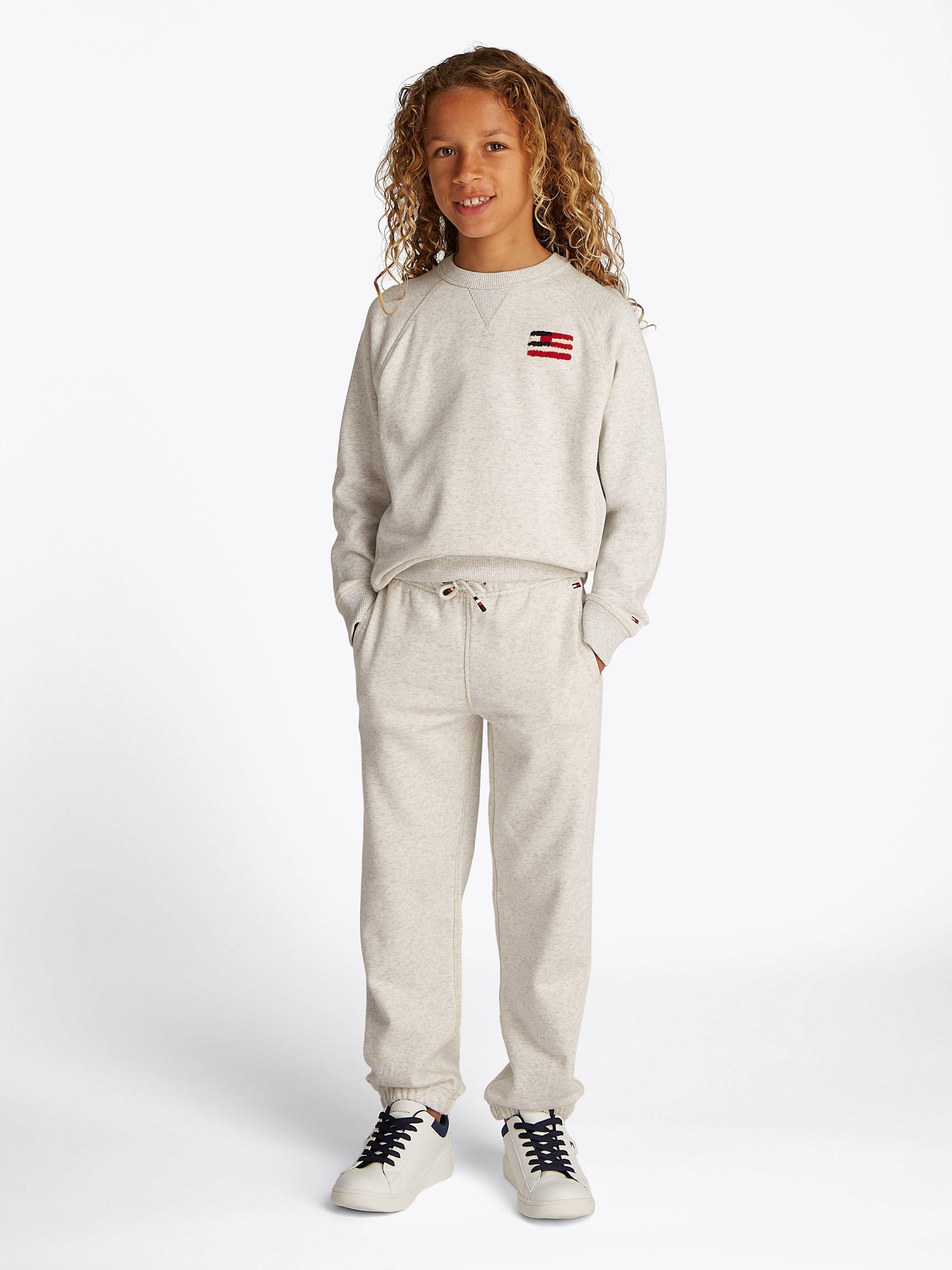 Product image 1 of 6, which shows Tommy Hilfiger Kids' Flag Relaxed Fit Sweatshirt, Snow White Heather, 6 years