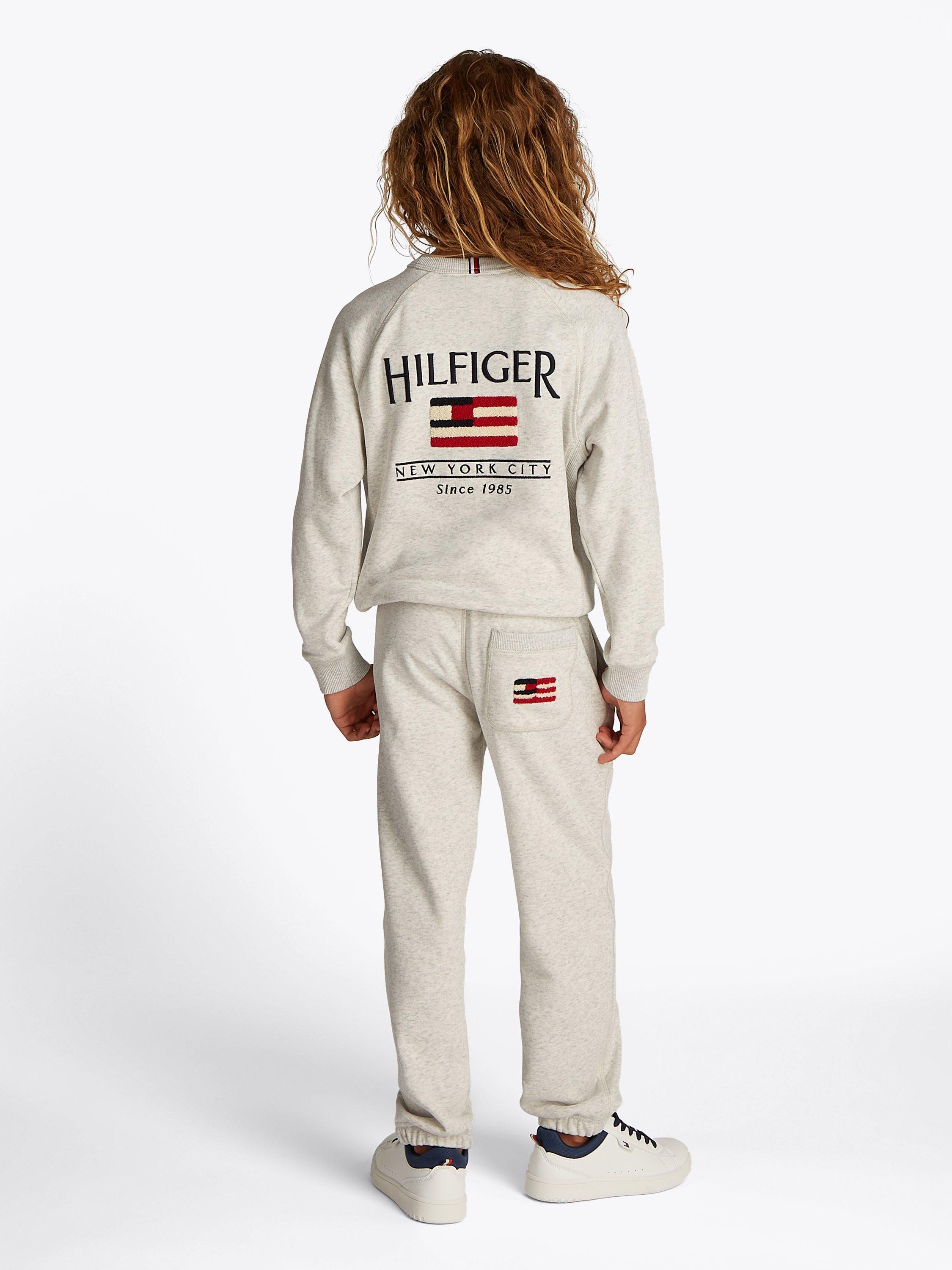 Product image 2 of 6, which shows Tommy Hilfiger Kids' Flag Relaxed Fit Sweatshirt, Snow White Heather, 6 years