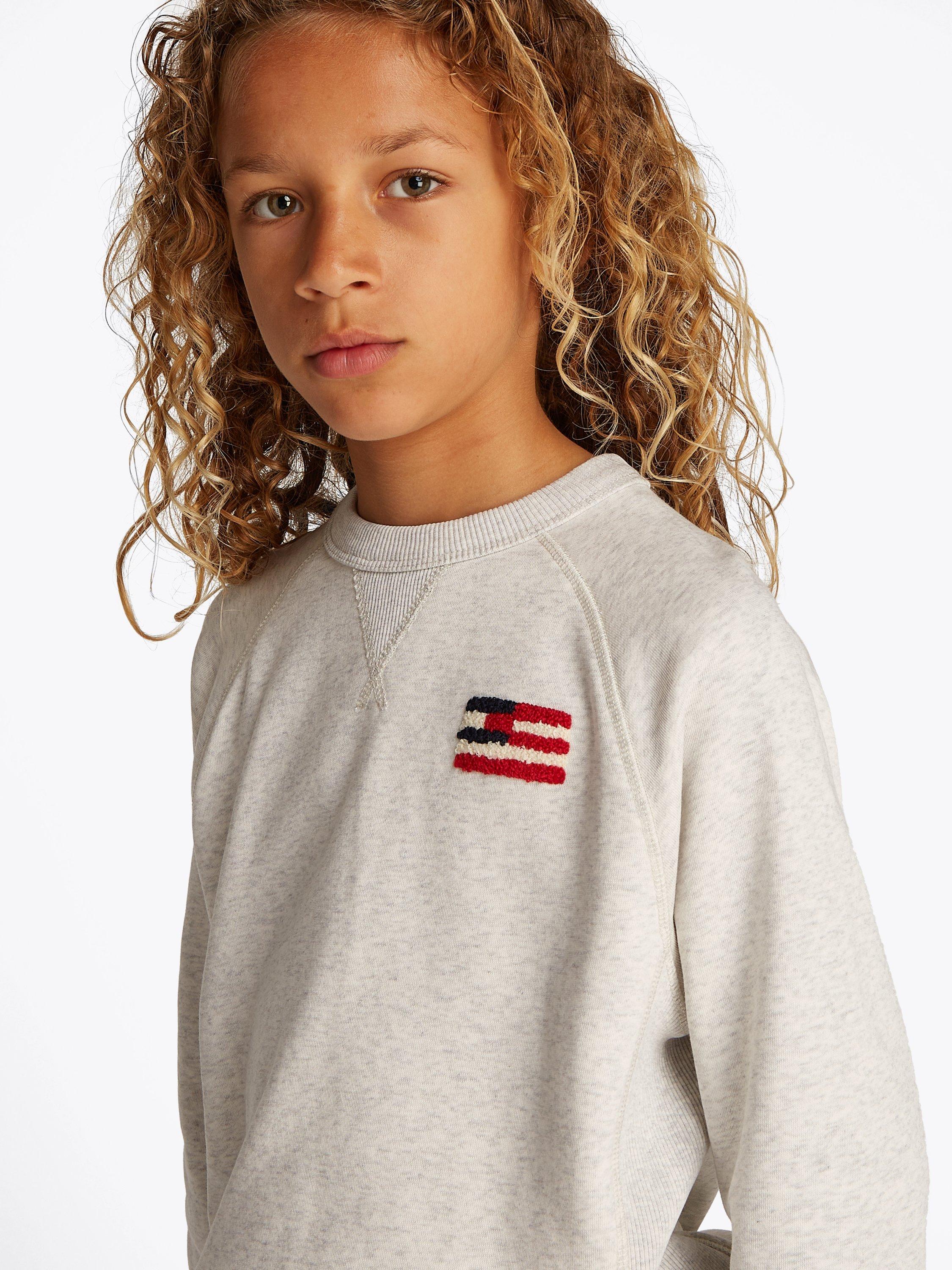 Product image 3 of 6, which shows Tommy Hilfiger Kids' Flag Relaxed Fit Sweatshirt, Snow White Heather, 6 years