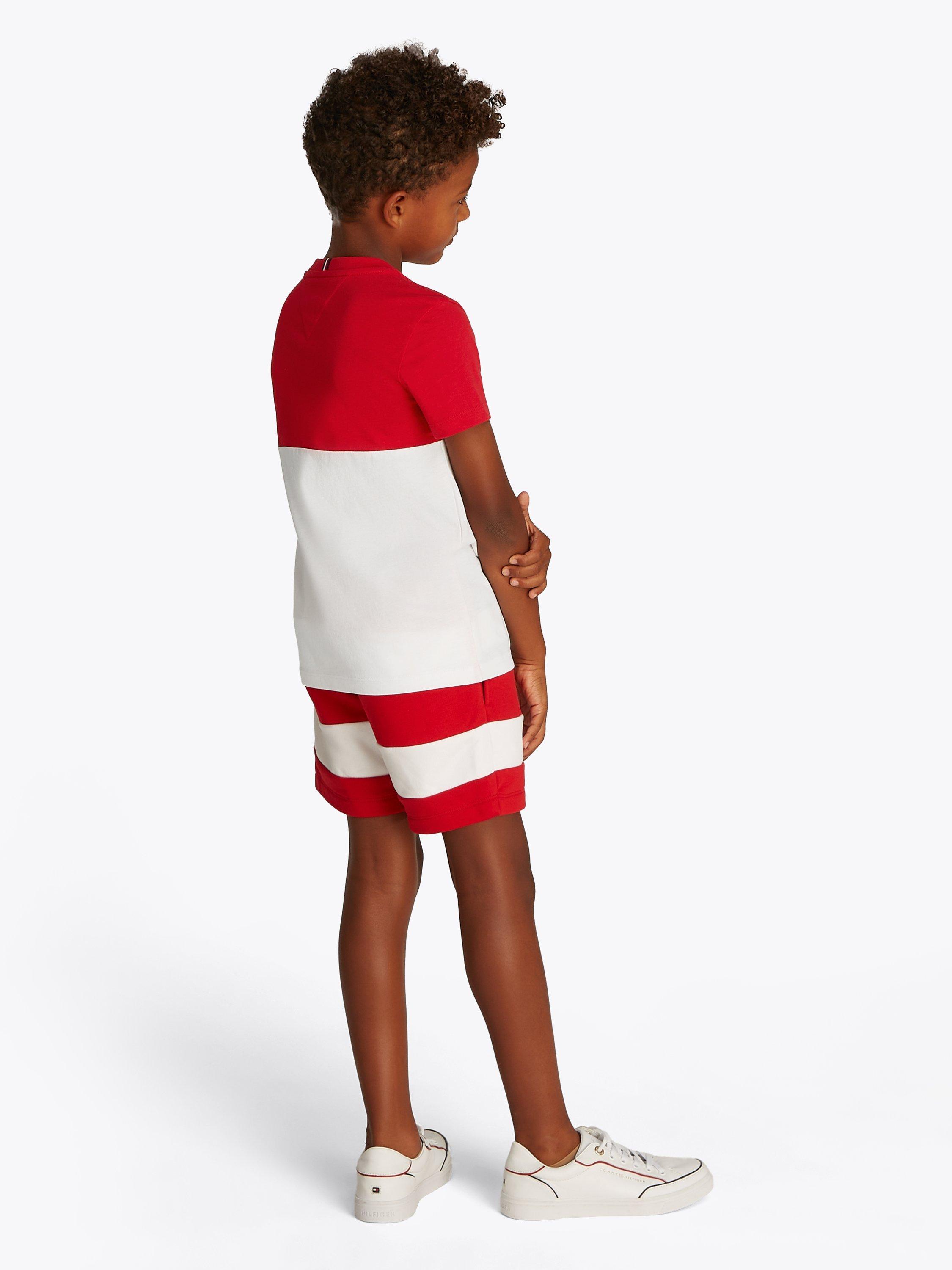 Product image 2 of 6, which shows Tommy Hilfiger Kids' Colour Block Crew Neck T-Shirt, Primary Red/White, 14 years