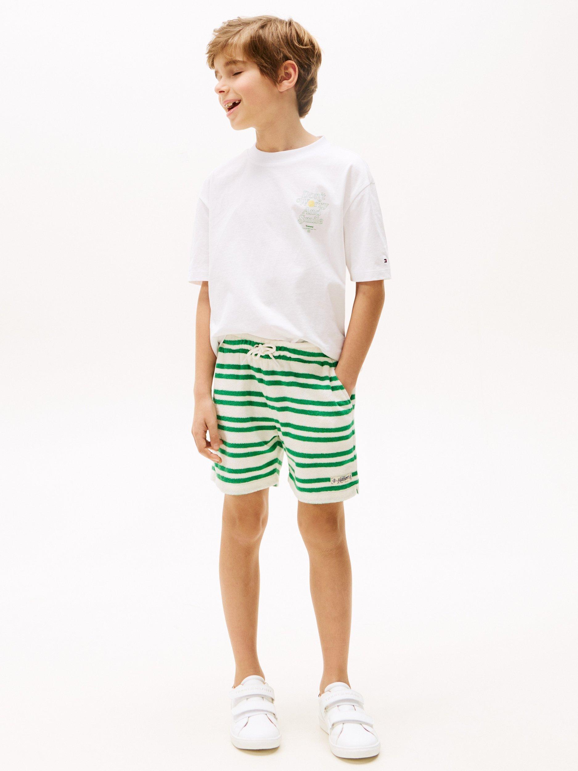 Product image 1 of 6, which shows Tommy Hilfiger Kids' Graphic Print T-Shirt, White, 12 years