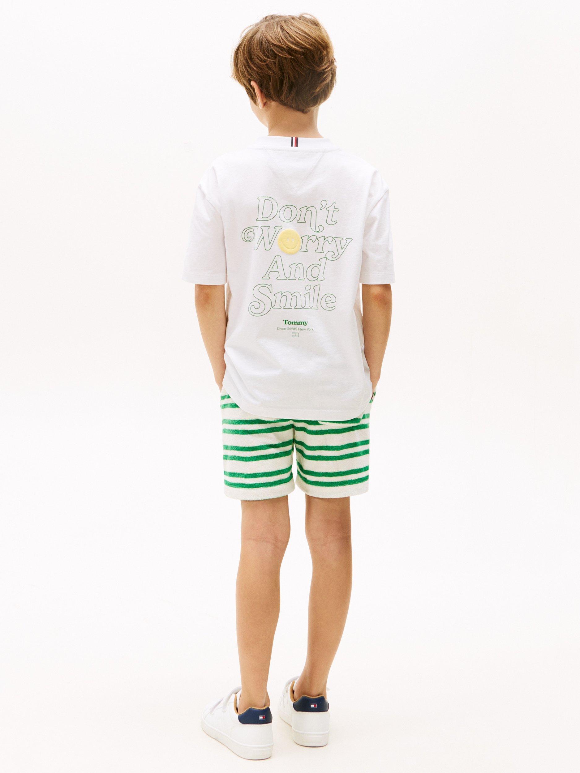 Product image 2 of 6, which shows Tommy Hilfiger Kids' Graphic Print T-Shirt, White, 12 years