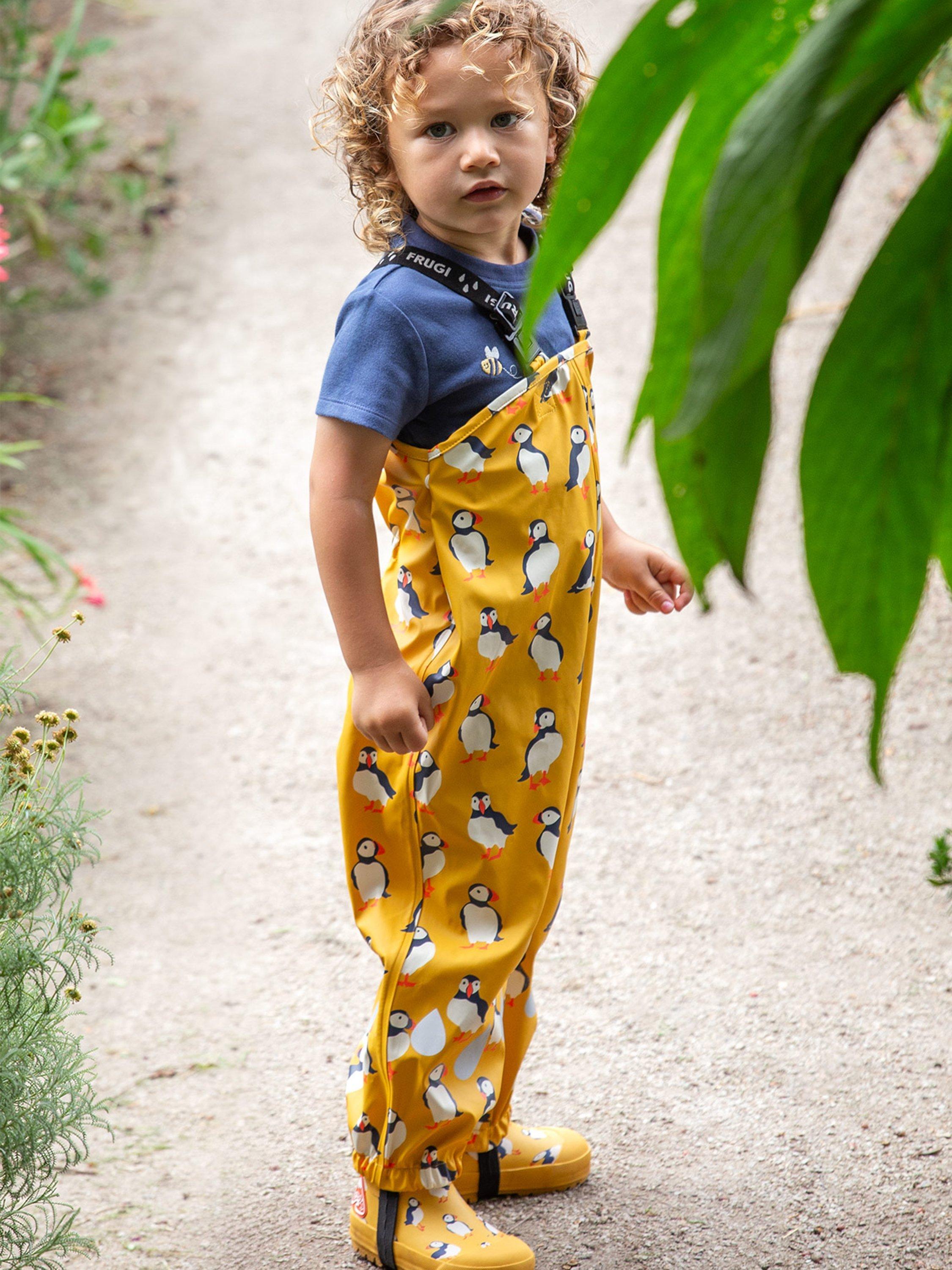 Product image 2 of 7, which shows Frugi Kids' Puddle Buster Waterproof Rain Trousers, Multi, 1-2 years