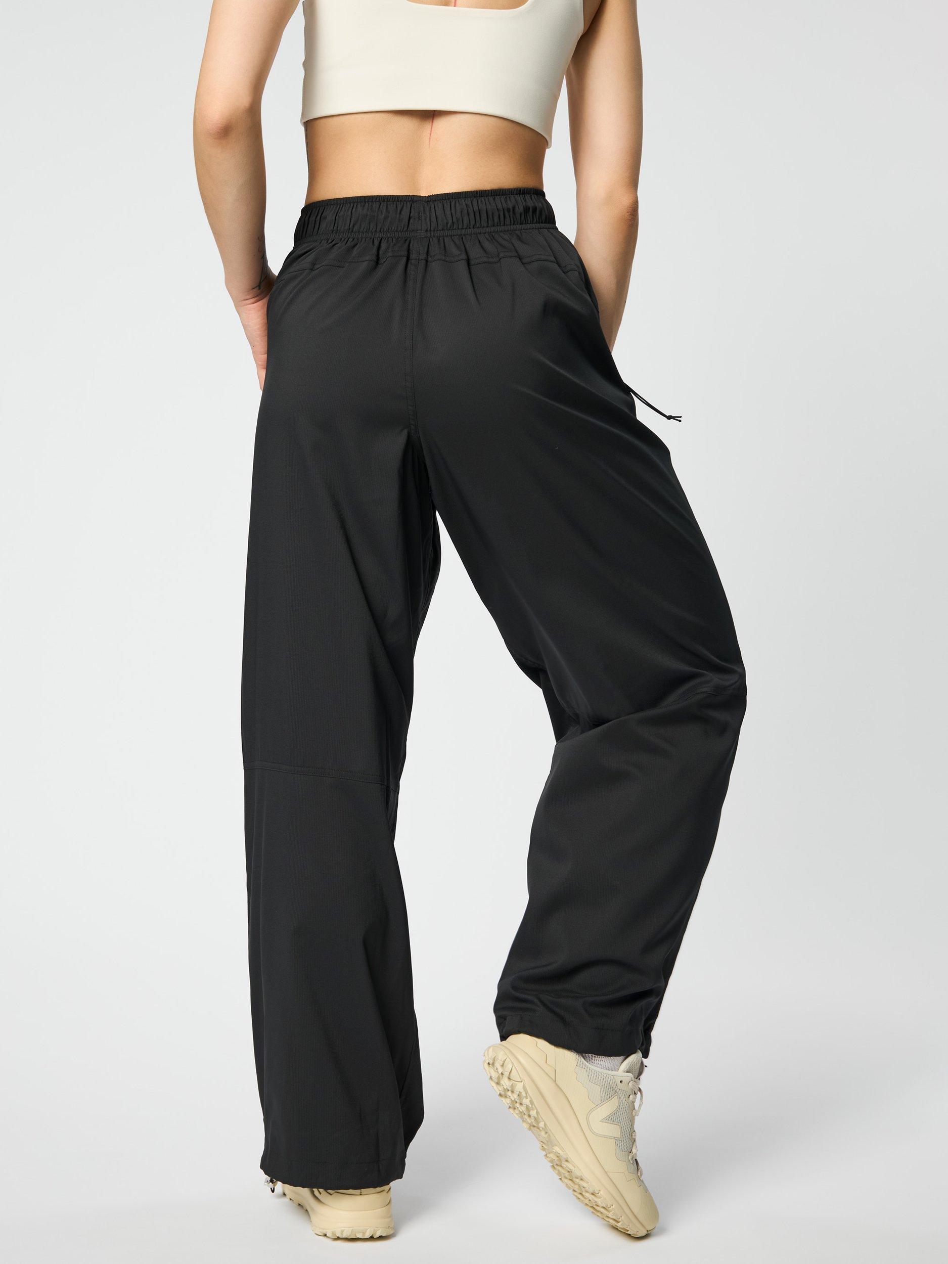 Product image 2 of 10, which shows Girlfriend Collective Amy Adjustable Trousers, Black, XS
