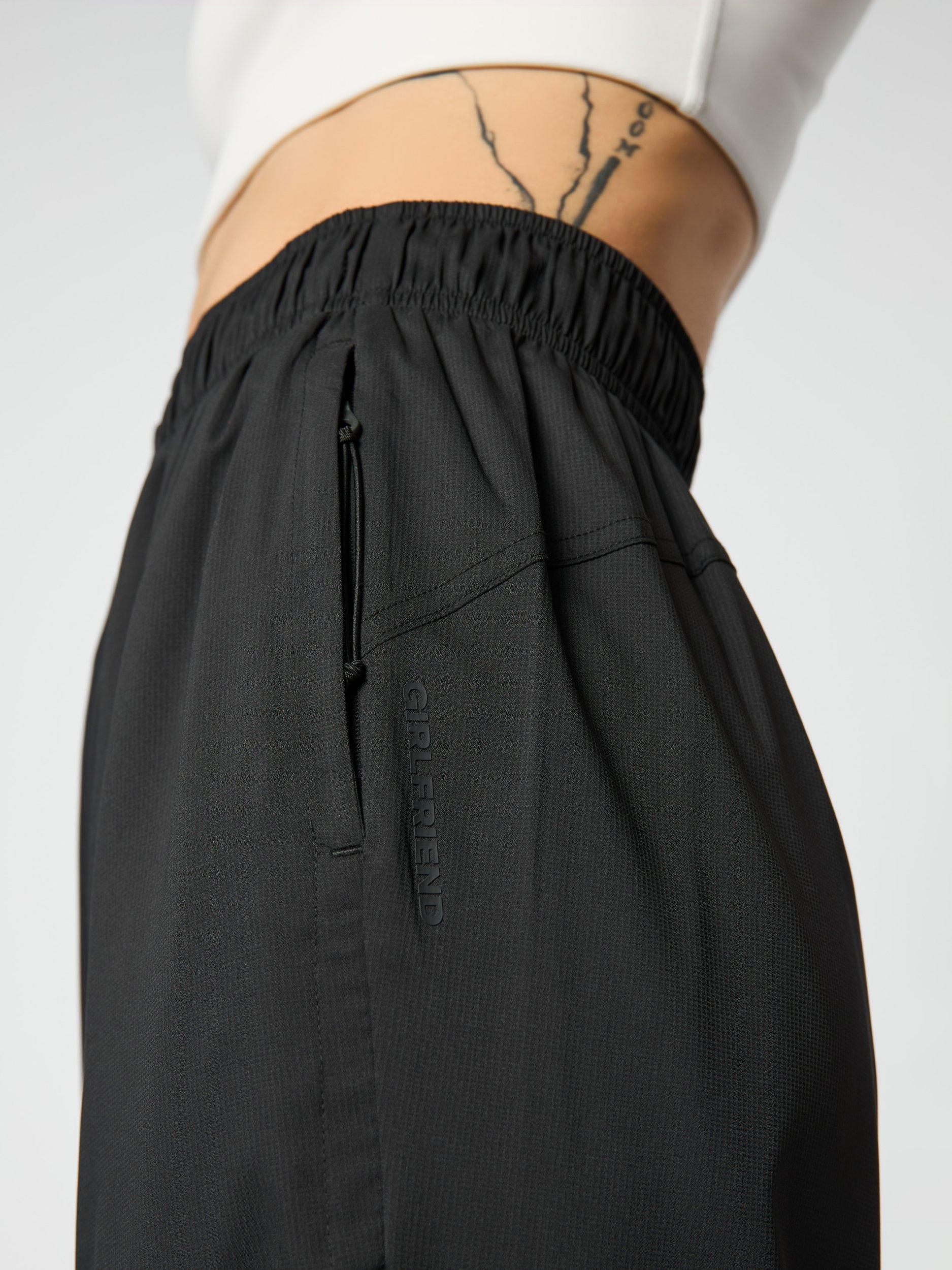 Product image 4 of 10, which shows Girlfriend Collective Amy Adjustable Trousers, Black, XS