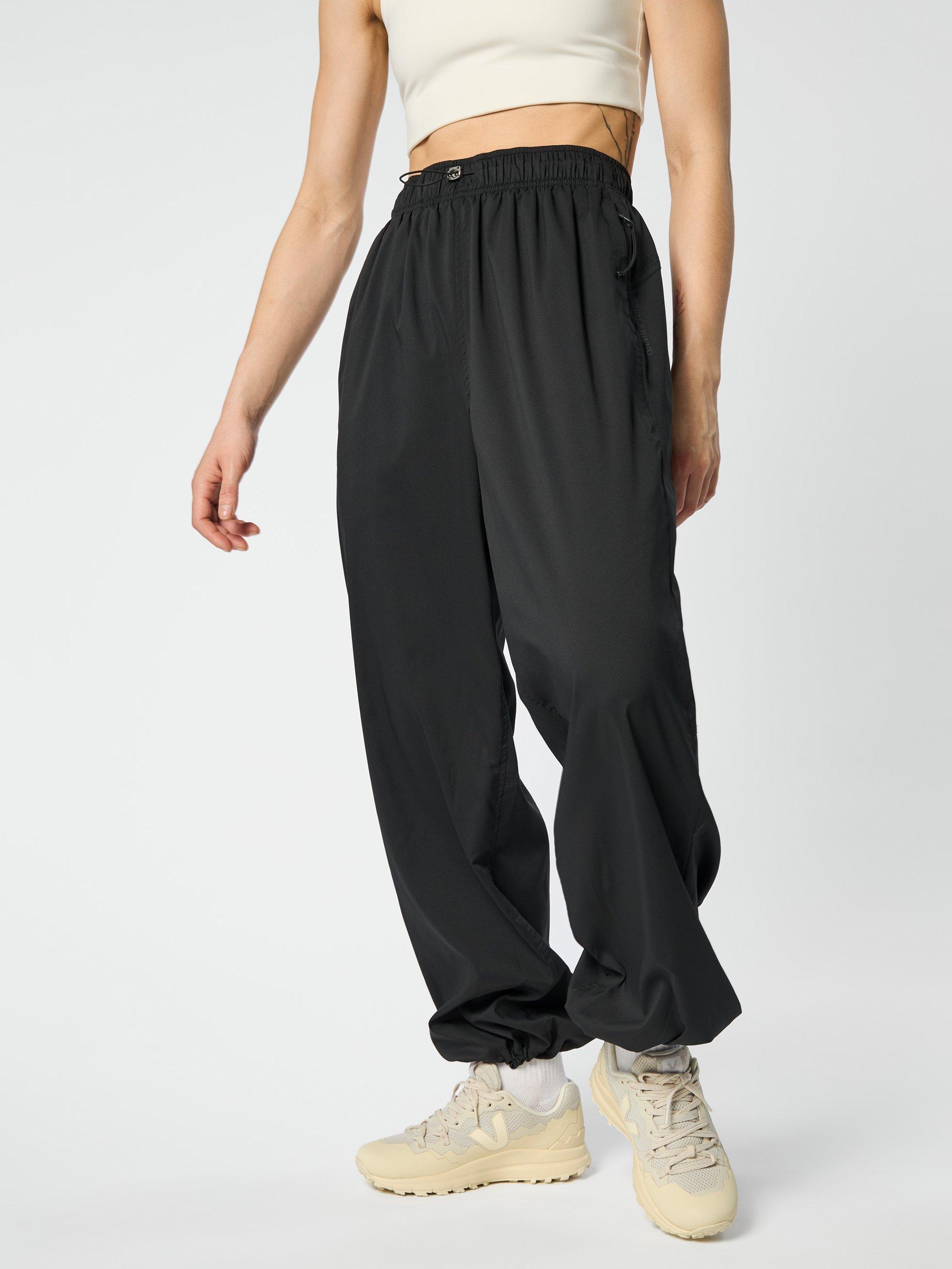 Product image 6 of 10, which shows Girlfriend Collective Amy Adjustable Trousers, Black, XS