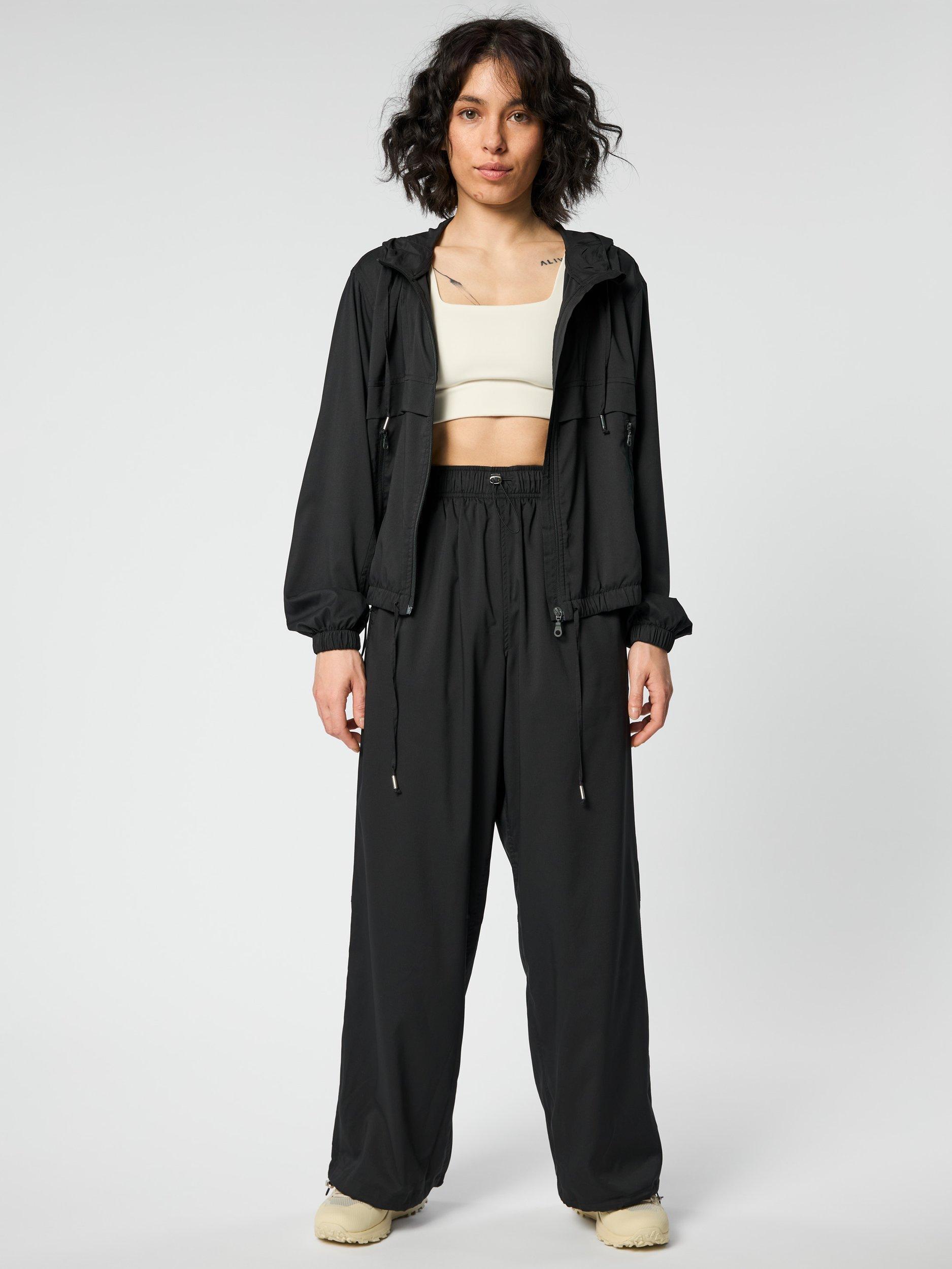 Product image 9 of 10, which shows Girlfriend Collective Amy Adjustable Trousers, Black, XS