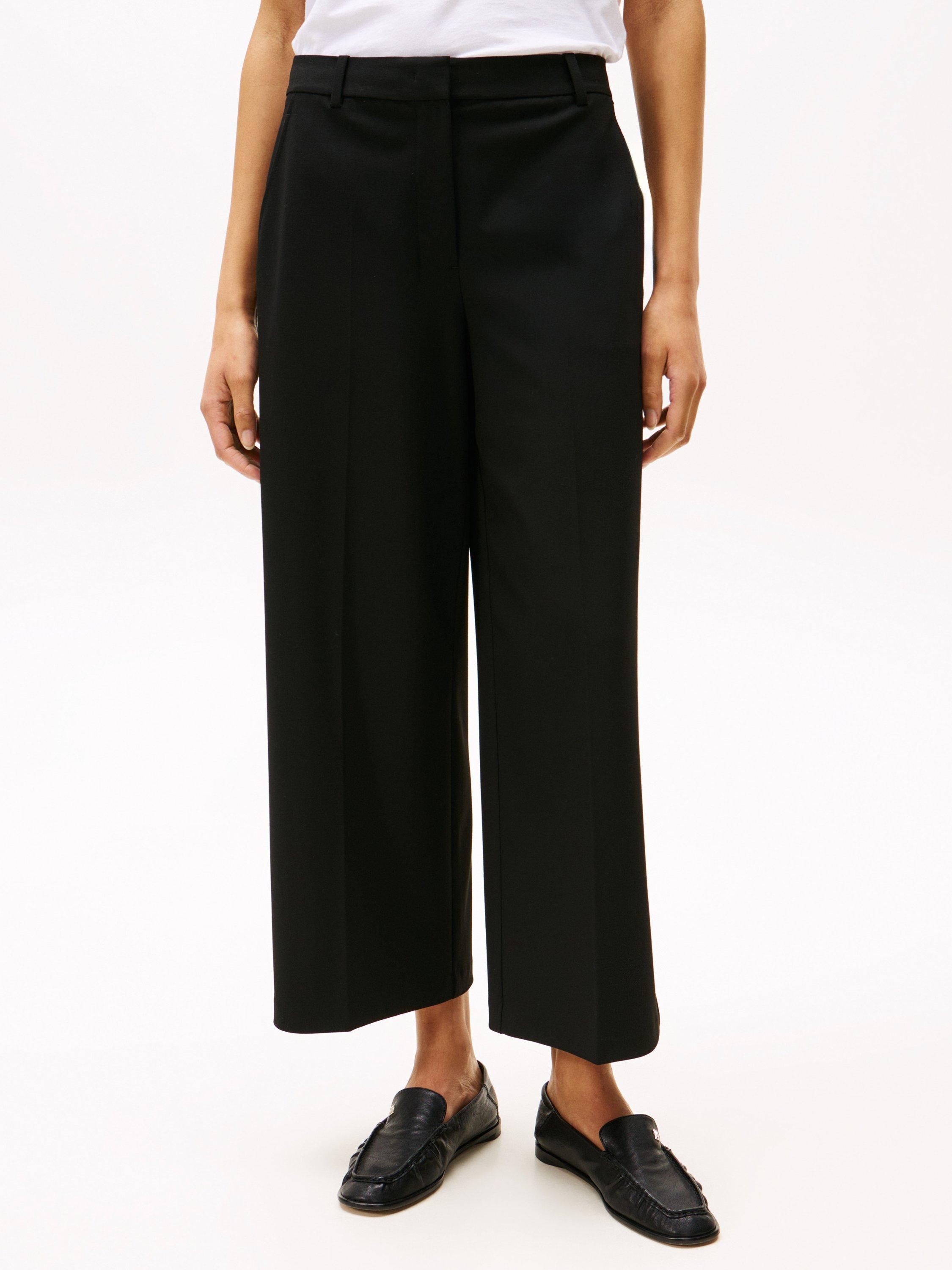 Product image 1 of 7, which shows Tommy Hilfiger Cropped Wide Leg Trousers, Black, 6