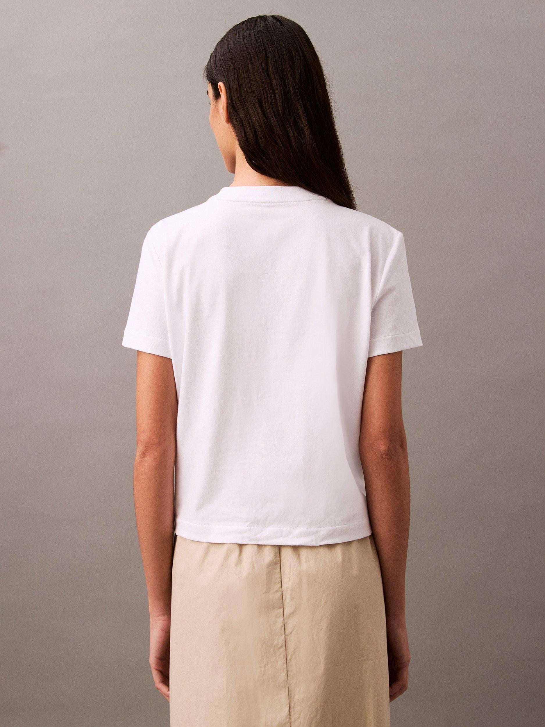 Product image 2 of 5, which shows Calvin Klein Jeans Cotton Fit Short Sleeve Logo T-Shirt, Brilliant White, M