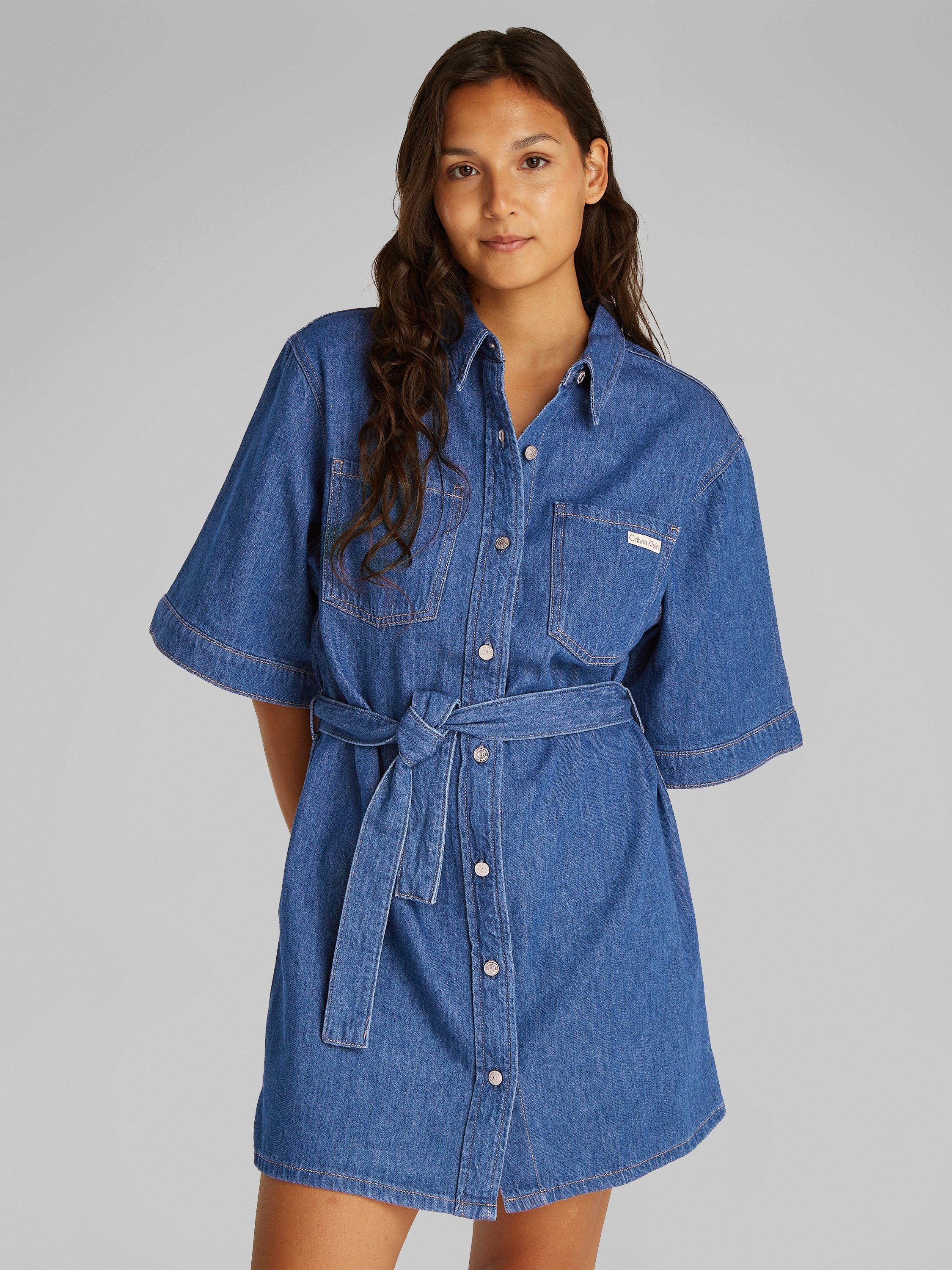 Product image 1 of 7, which shows Calvin Klein Boxy Denim Mini Shirt Dress, Medium Blue, XS