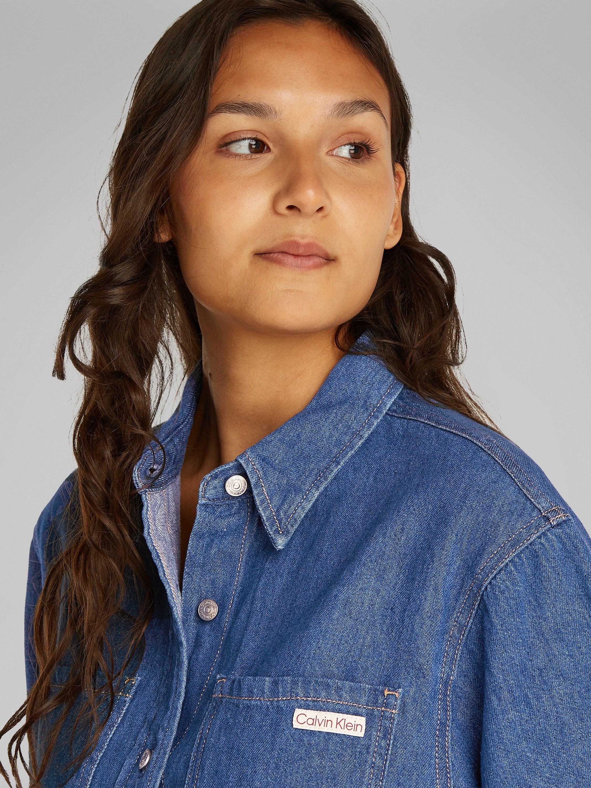 Product image 4 of 7, which shows Calvin Klein Boxy Denim Mini Shirt Dress, Medium Blue, XS