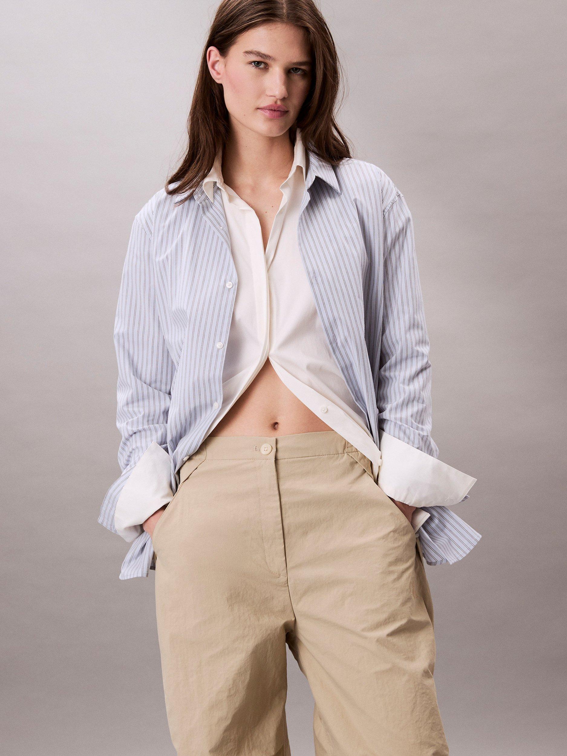 Product image 1 of 2, which shows Calvin Klein Crinkle Parachute Trousers, Off White, XS