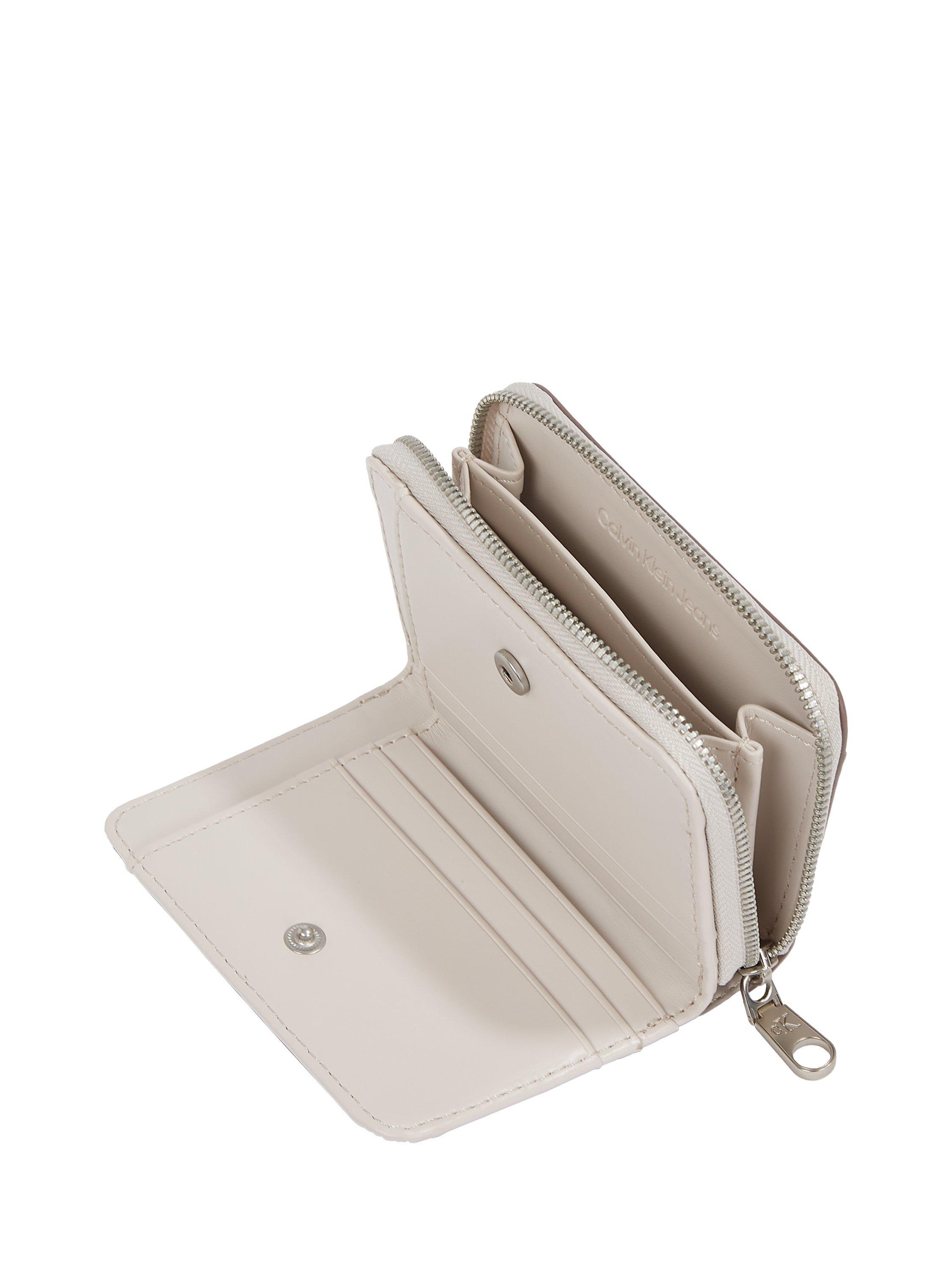 Product image 3 of 4, which shows Calvin Klein Embossed Logo Zip Around Purse, Wind Chime