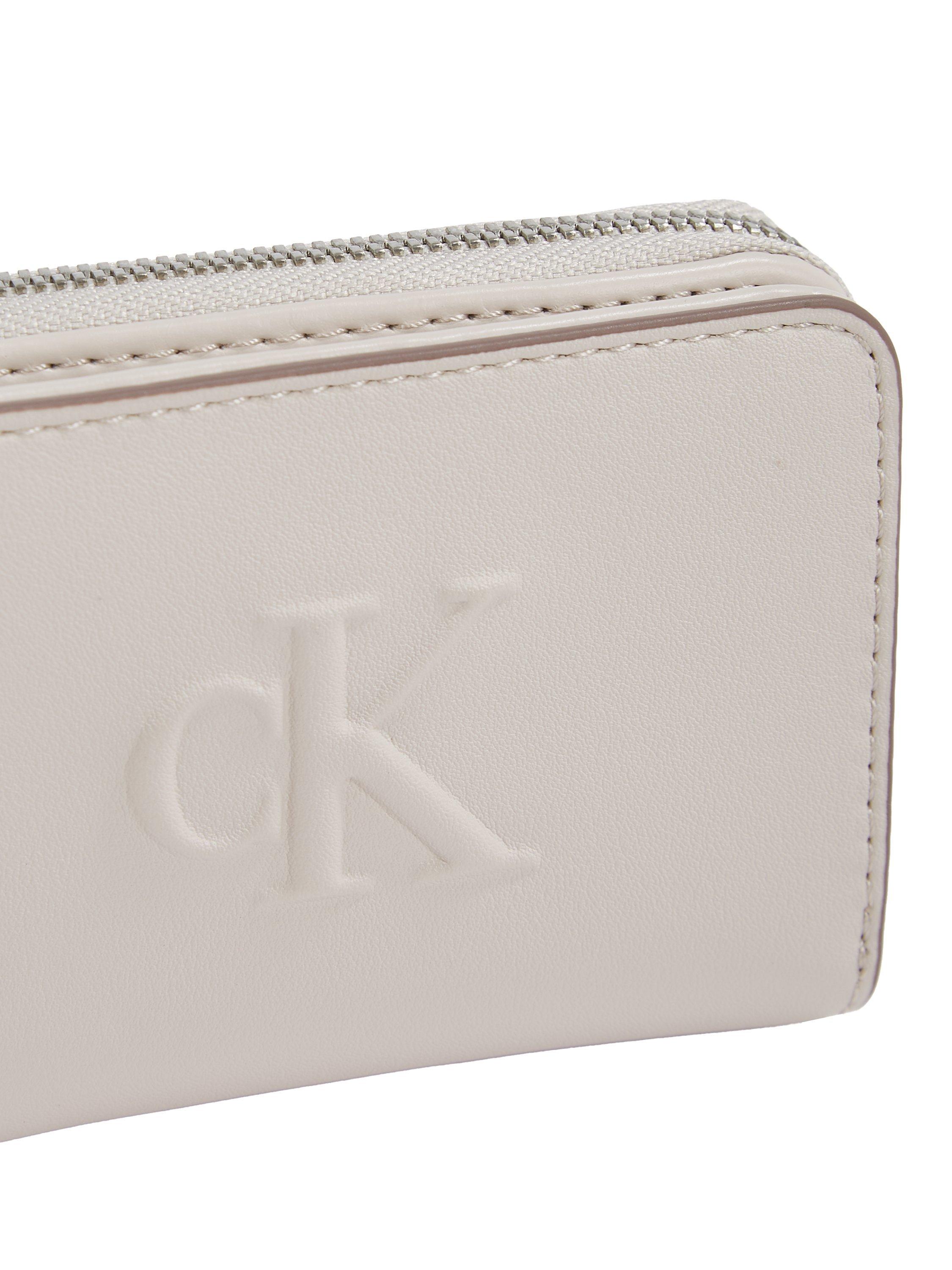 Product image 4 of 4, which shows Calvin Klein Embossed Logo Zip Around Purse, Wind Chime