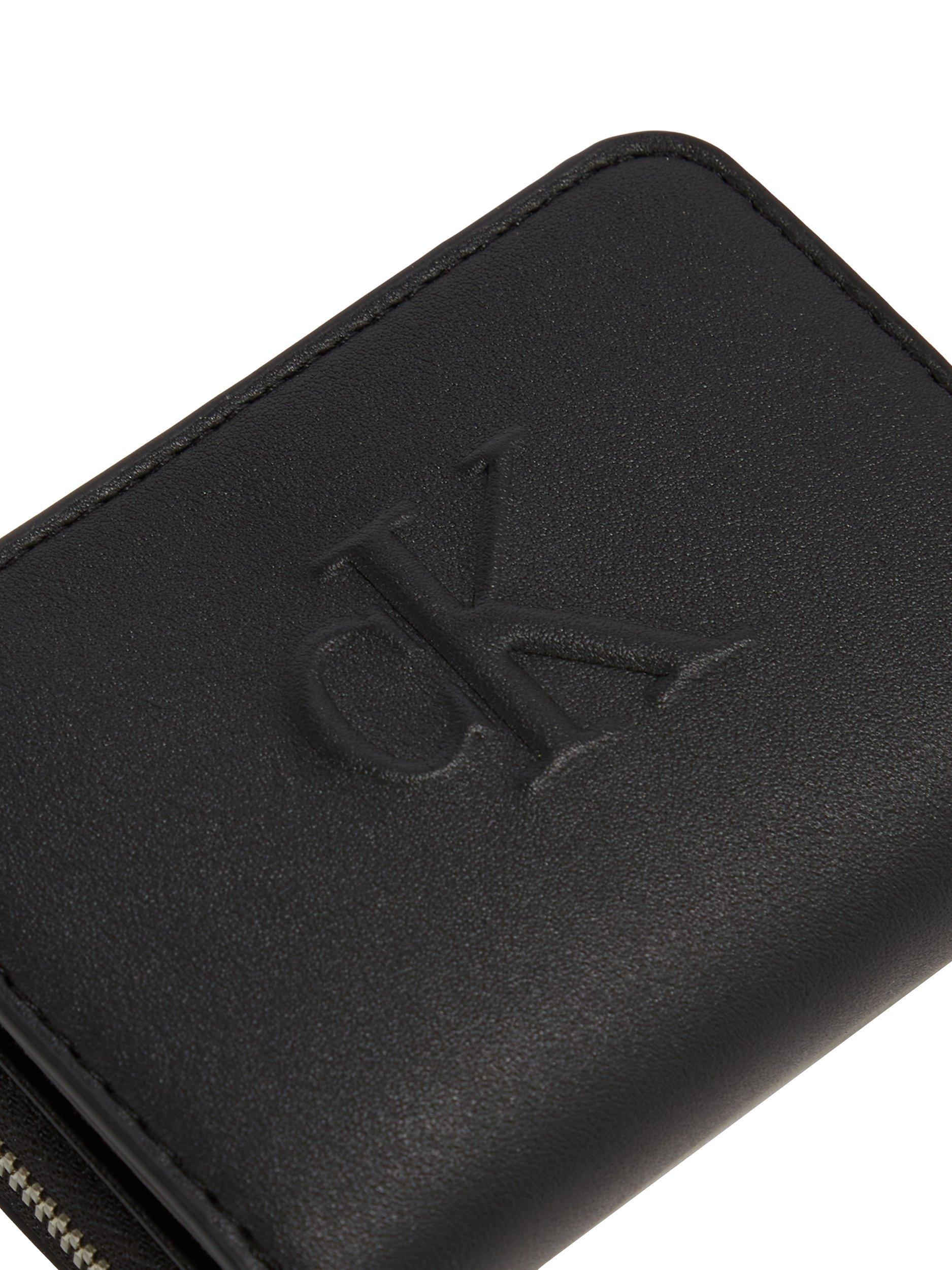 Product image 4 of 4, which shows Calvin Klein Embossed Logo Zip Around Purse, Black