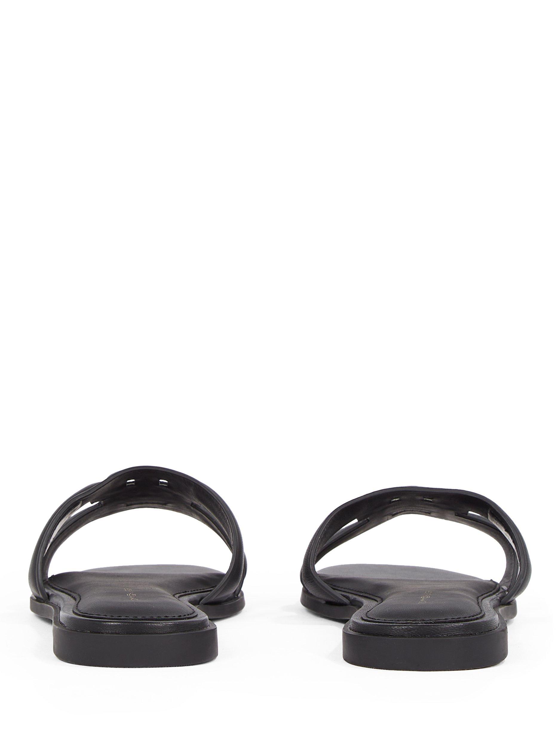 Product image 4 of 6, which shows Tommy Hilfiger Leather TH Monogram Mule Sandals, Black, EU36