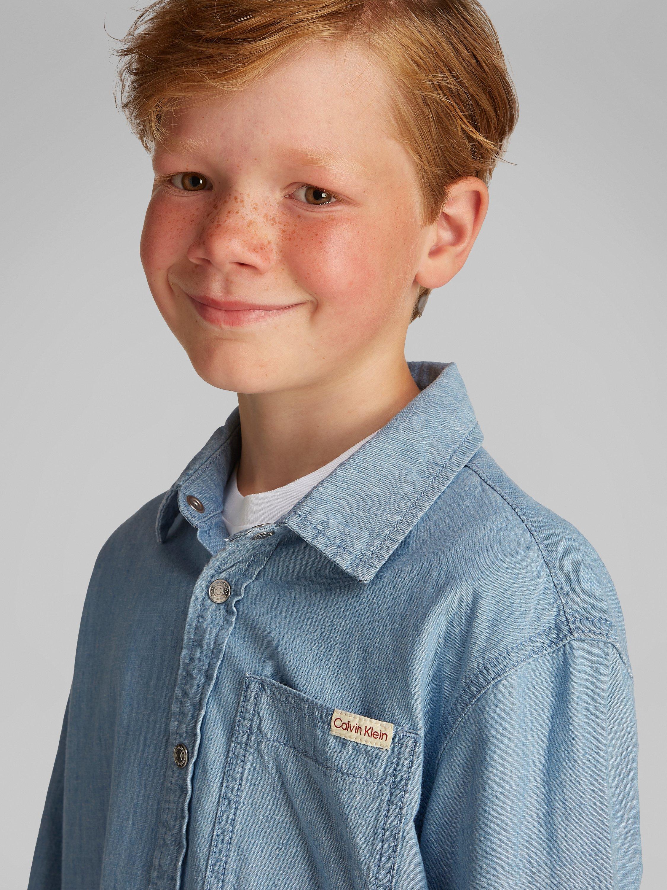 Product image 3 of 6, which shows Calvin Klein Kids' Relaxed Chambray Shirt, Azure Light, 8 years