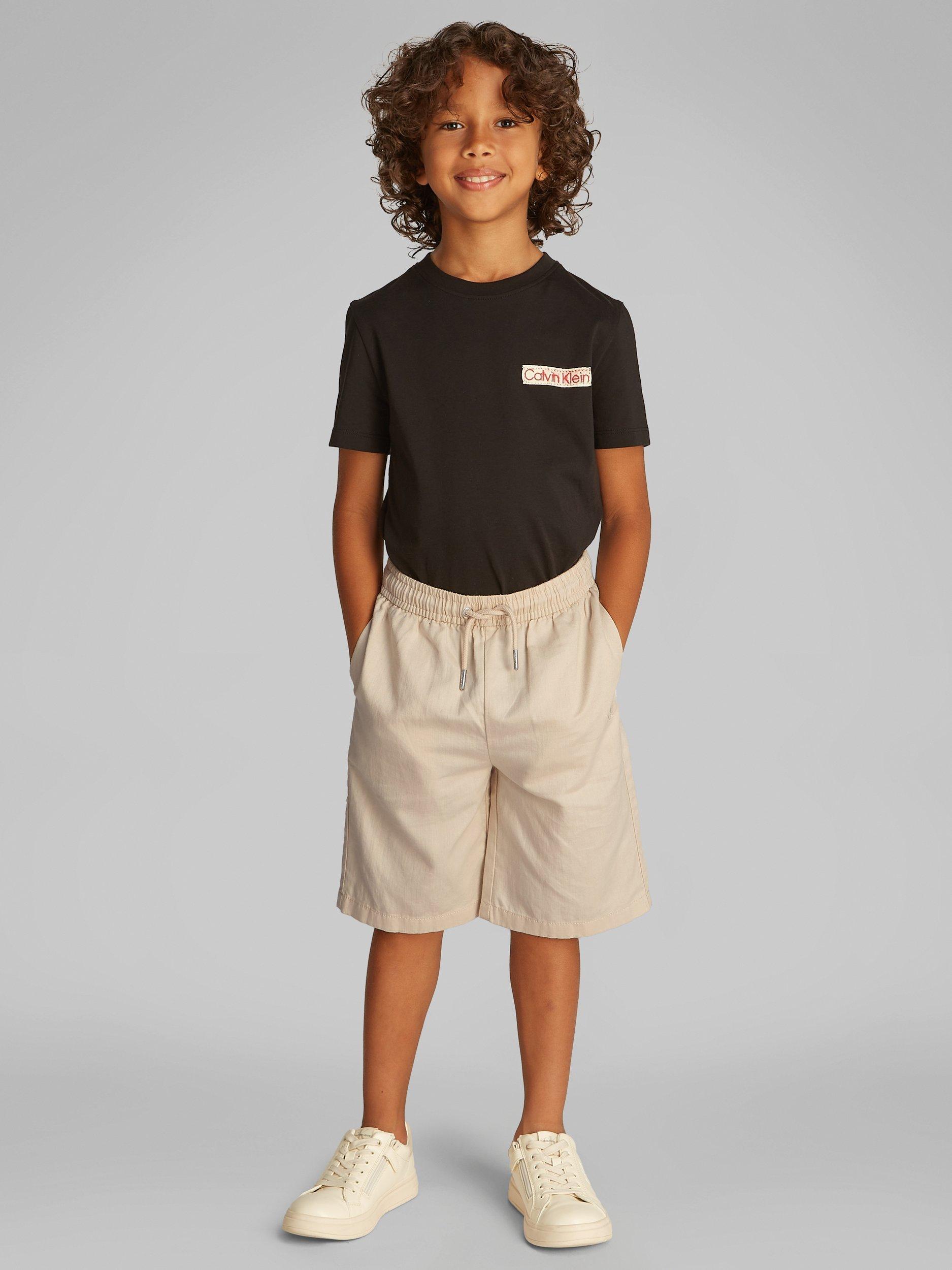Product image 1 of 6, which shows Calvin Klein Kids' Relaxed Longline Shorts, Oyster Gray, 8 years