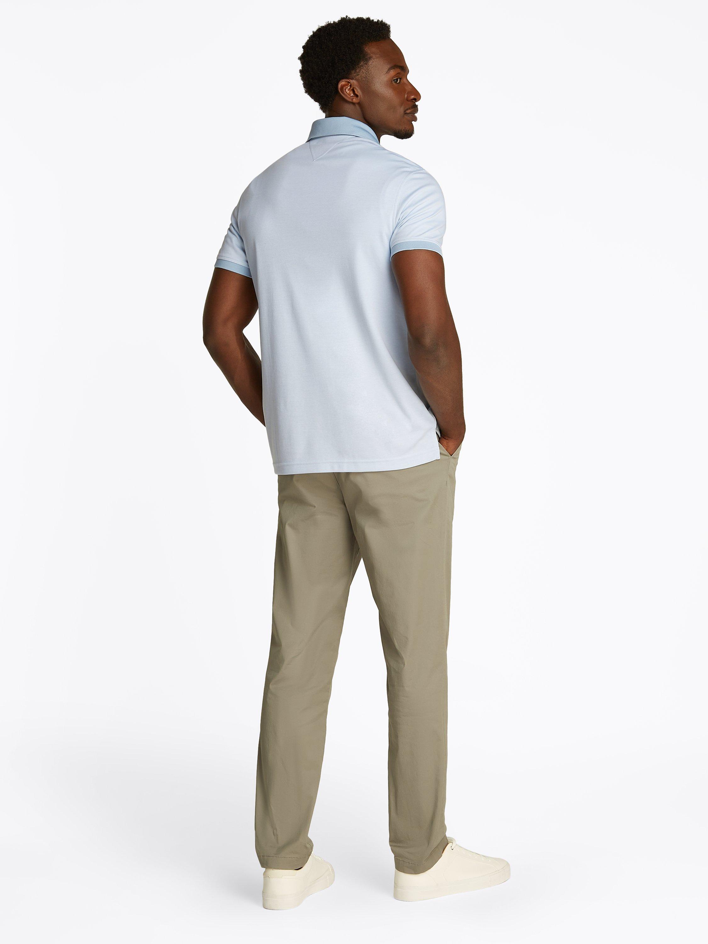 Product image 3 of 6, which shows Tommy Hilfiger Cotton Blend Regular Fit Short Sleeve Polo Shirt, Breezy Blue/White, S