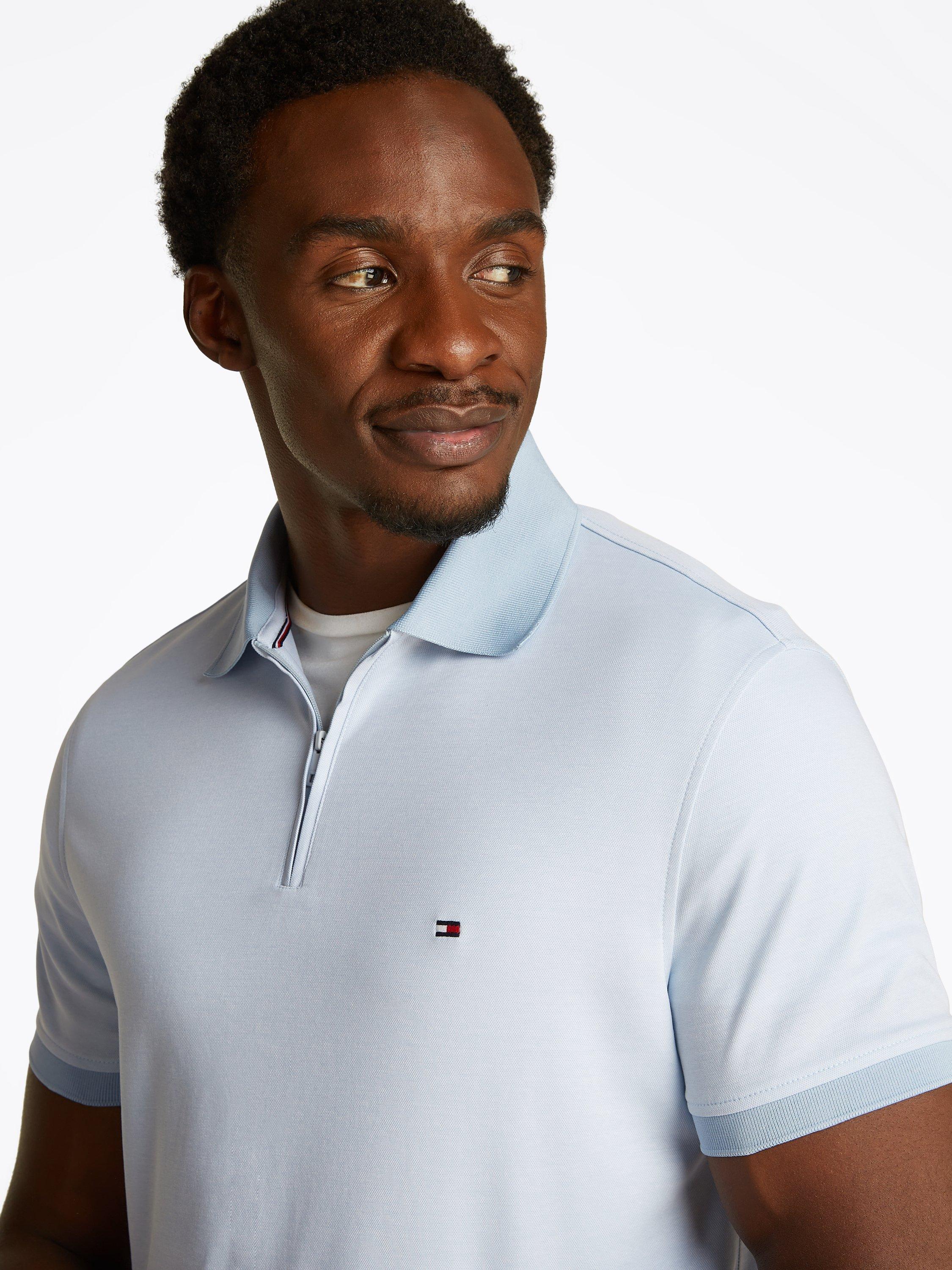 Product image 4 of 6, which shows Tommy Hilfiger Cotton Blend Regular Fit Short Sleeve Polo Shirt, Breezy Blue/White, S