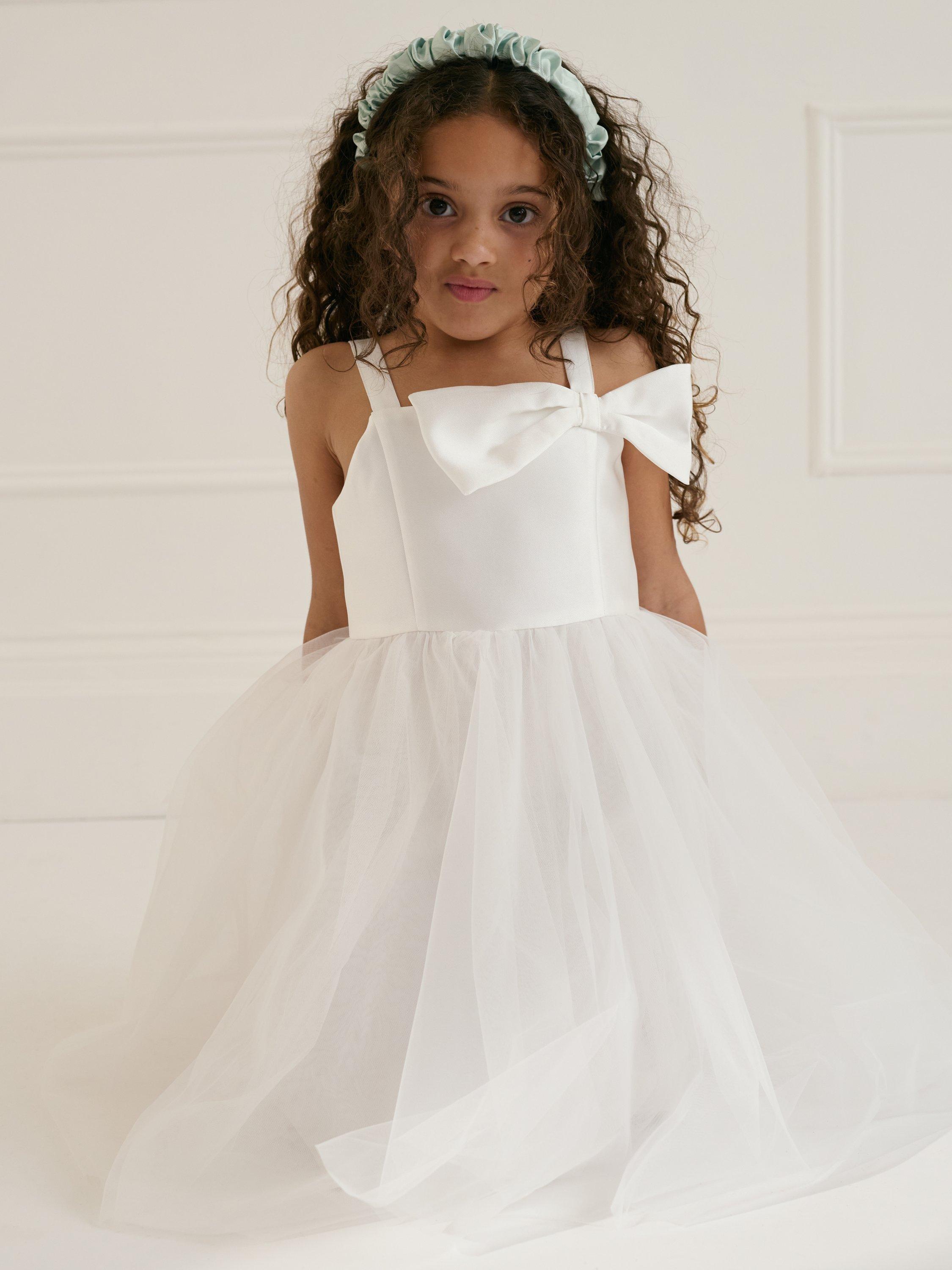 Product image 1 of 4, which shows Monsoon Kids' Betty Bow Dress, Ivory, 3 years