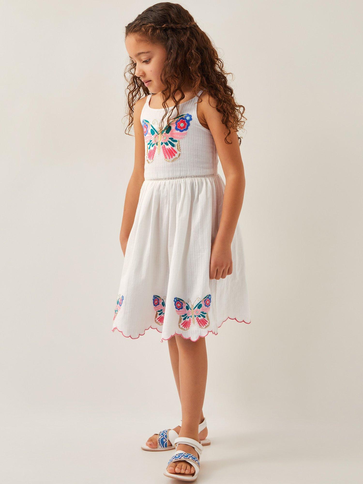 Product image 1 of 4, which shows Monsoon Kids' Butterfly Embroidered Sun Dress, Ivory, 2-3 years