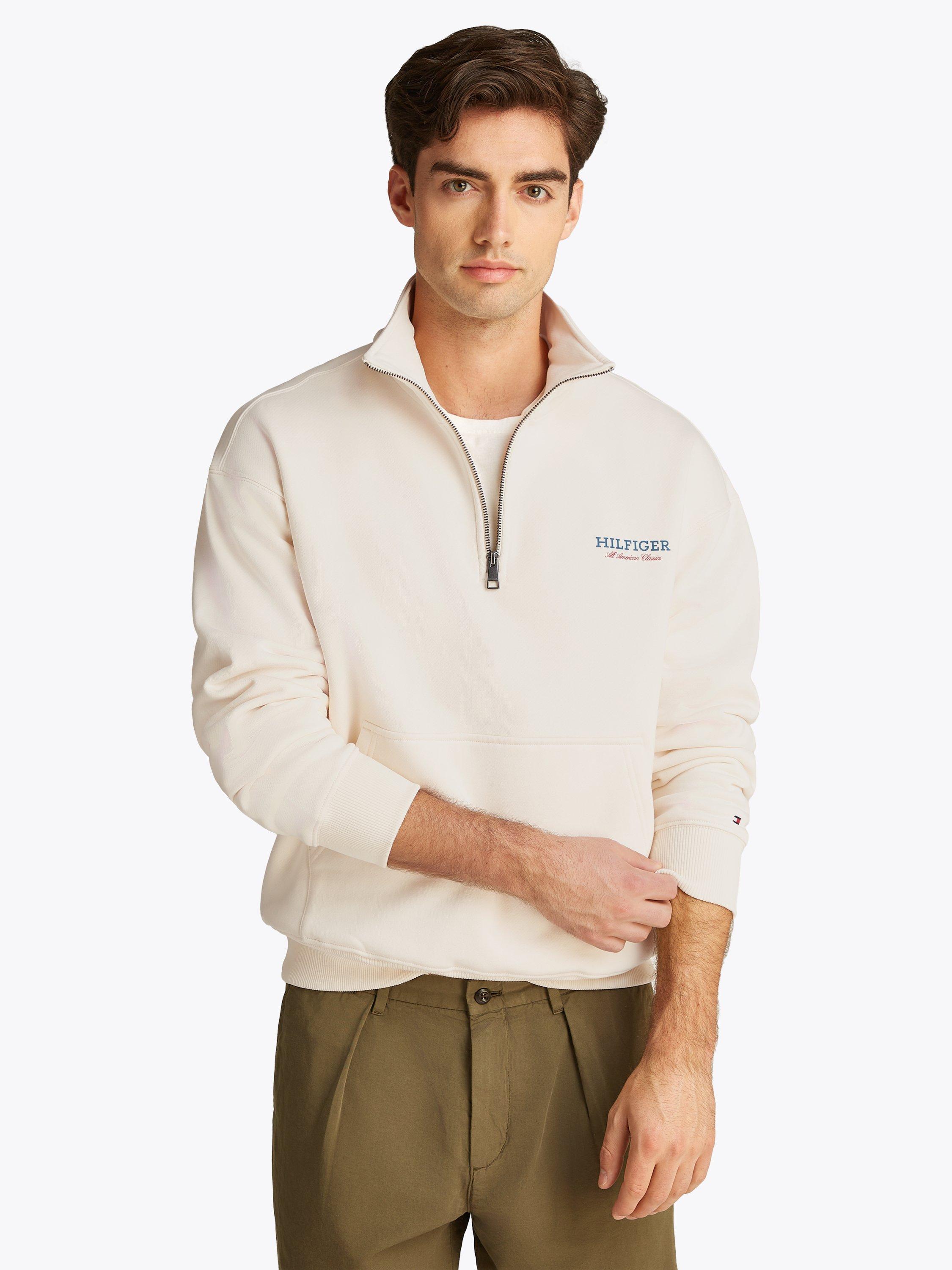Product image 1 of 6, which shows Tommy Hilfiger Monotype Quarter Zip Sweatshirt, Ivory Petal, M