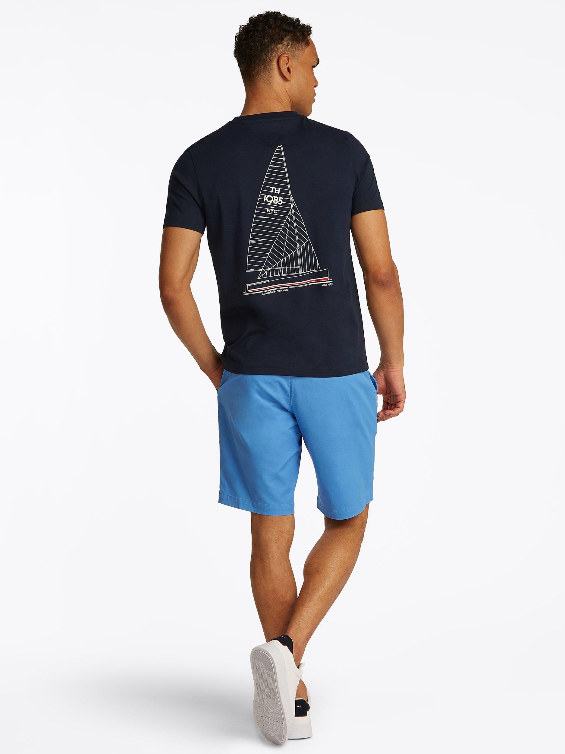 Product image 3 of 6, which shows Tommy Hilfiger Cotton Regular Fit Short Sleeve Back Graphic T-Shirt, Desert Sky, M