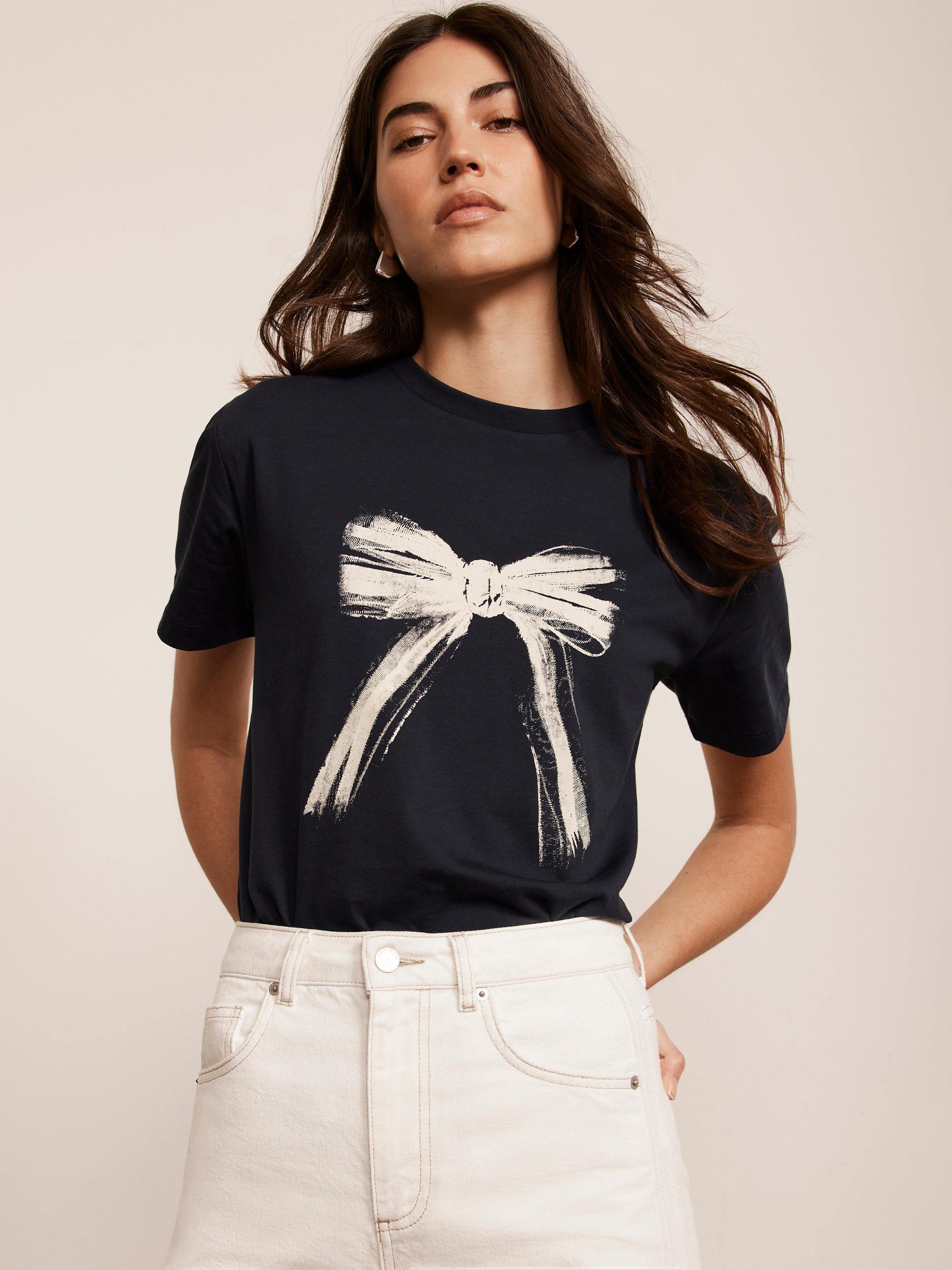 Product image 1 of 7, which shows Mint Velvet Graphic Bow T-Shirt, Blue Navy, L