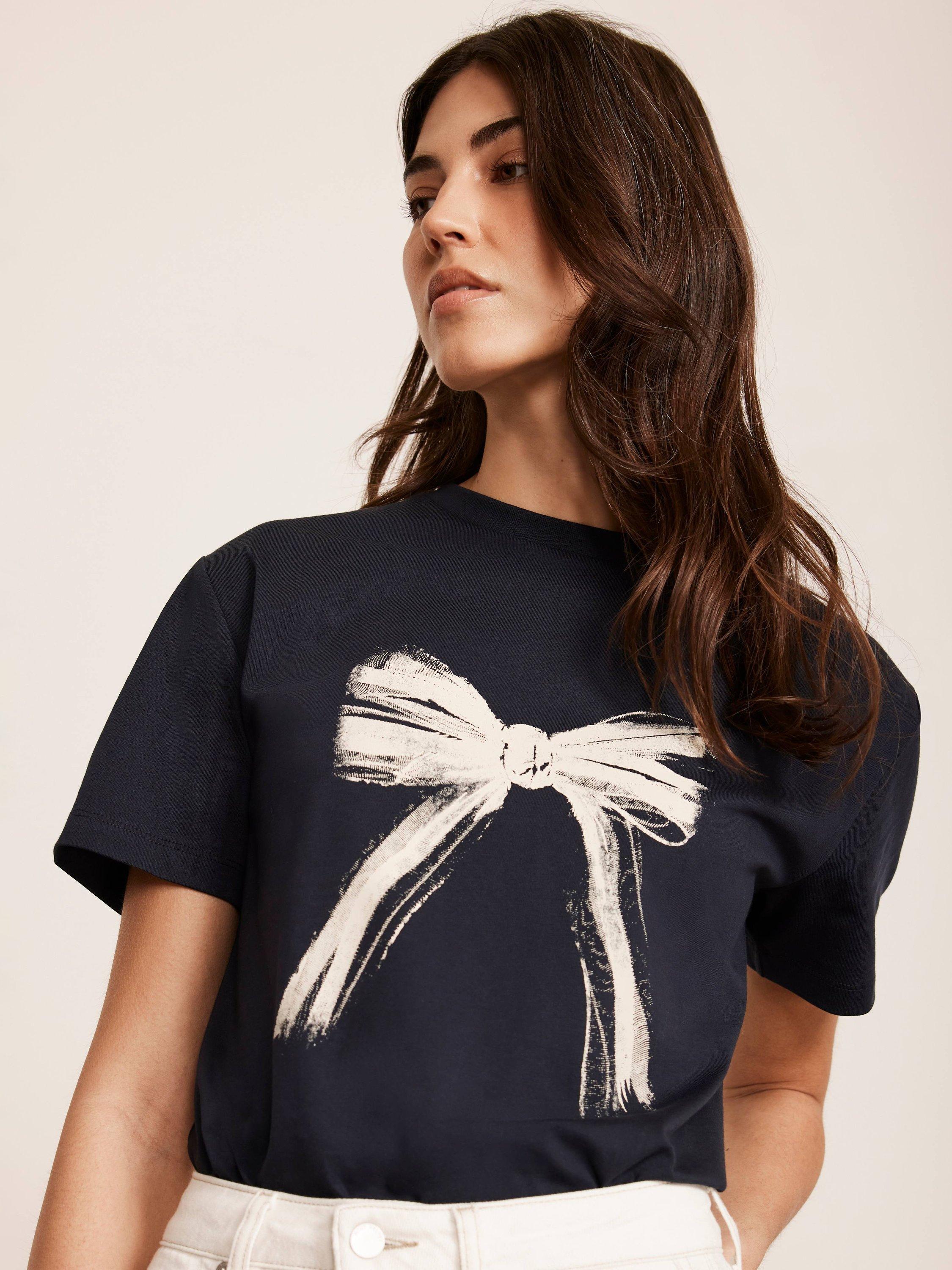 Product image 2 of 7, which shows Mint Velvet Graphic Bow T-Shirt, Blue Navy, L