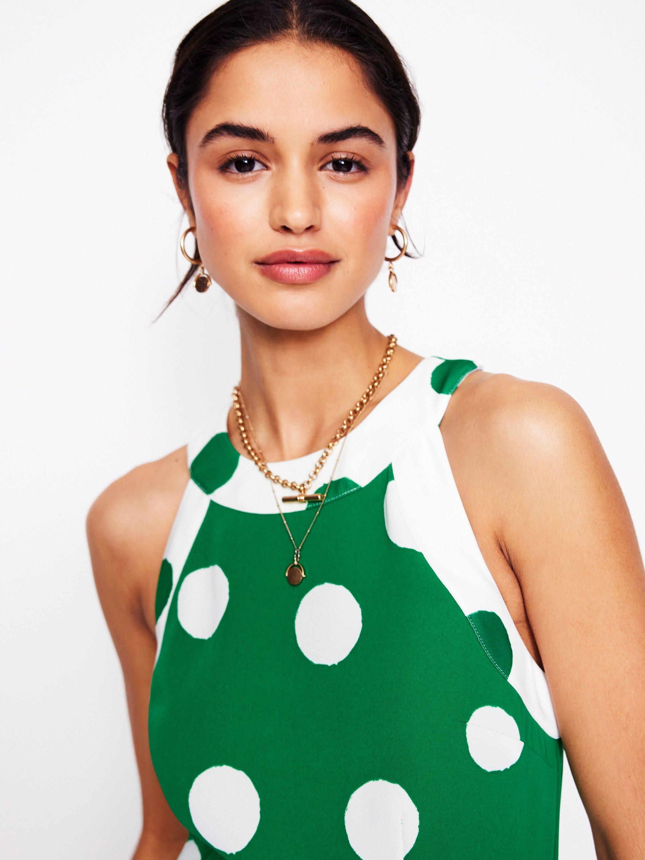 Product image 4 of 9, which shows Boden Polka Dot Halterneck Jumpsuit, Emerald/White, 8