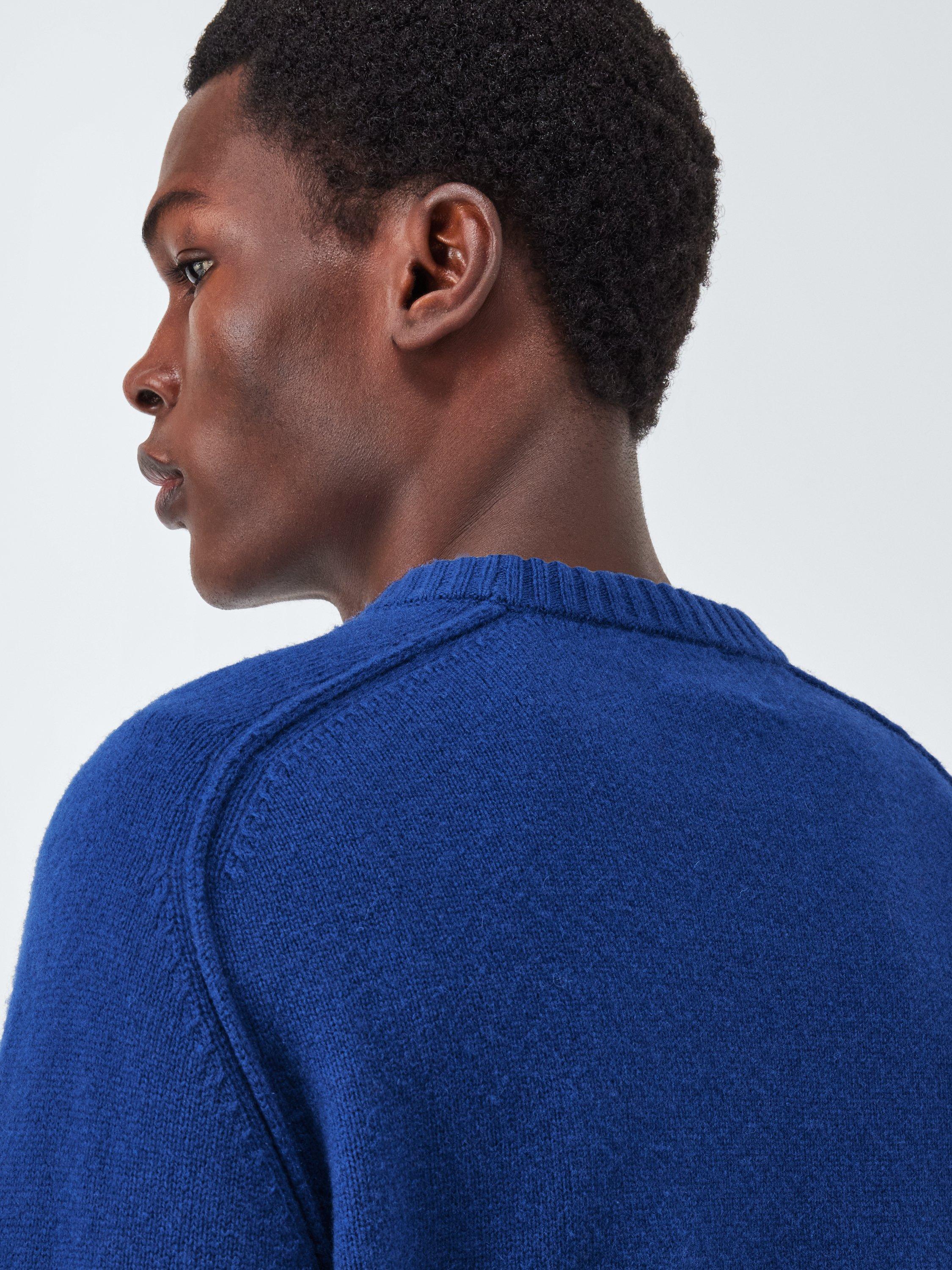Product image 5 of 6, which shows John Lewis Lambswool Rich Reverse Seam Crew Neck Jumper, Regal, M